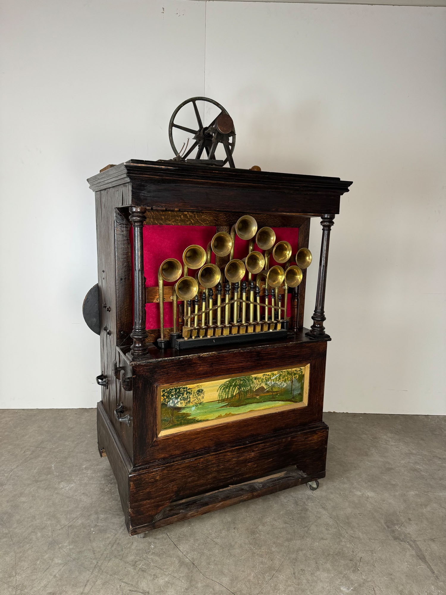 Wurlitzer Style 105 41-Key Military Band Organ: Wurlitzer Style 105 41-Key Military Band Organ. Operated by paper music rolls. The outside features 13 visible brass trumpets and 13 brass piccolos with many wooden pipes on the inside. Good visual co