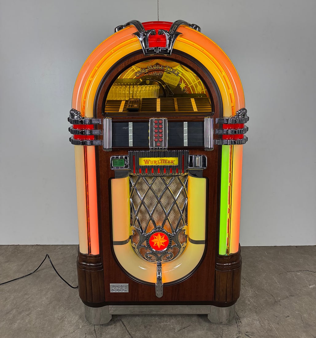 Wurlitzer 1015 OMT 100 Selection 45 RPM Vinyl Jukebox with Bubble Tubes 1987-2013: Deutsche Wurlitzer 1015 OMT 100 selection 45 RPM vinyl jukebox with bubble tubes 1987-2013. Model no.: CD-K-99, featuring the better K-99 amplifier. Visual condition: in excellent visual condition sho