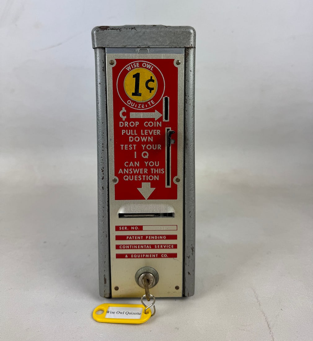 Continental Service & Equipment Co. 1 Cent "Wise Owl Quizette" ca. 1950: Continental Service & Equipment Co. 1 cent "Wise Owl Quizette" quiz question card vendor ca. 1950. Good visual condition. Comes with the keys. Dimensions (H x W x D): 26 x 9.5 x 12.5 cm. Condition: Go