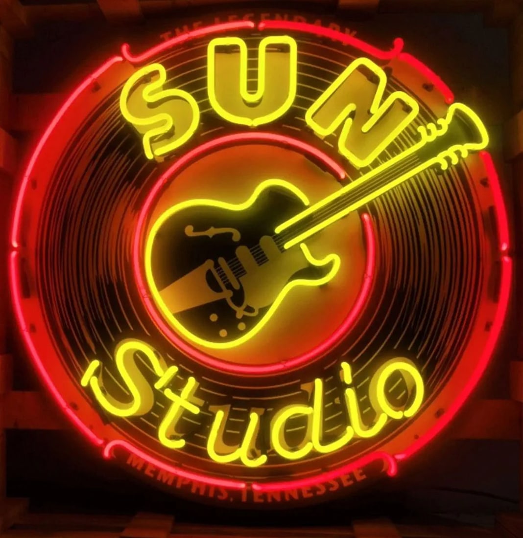 Large Sun Studio Logo Neon Sign with Printed Back Plate: Large Sun Studio logo real glass tube neon sign with printed back plate. The colorful printed back plate ensures that the neon sign looks great whether it's powered on or off. It is in excellent, like