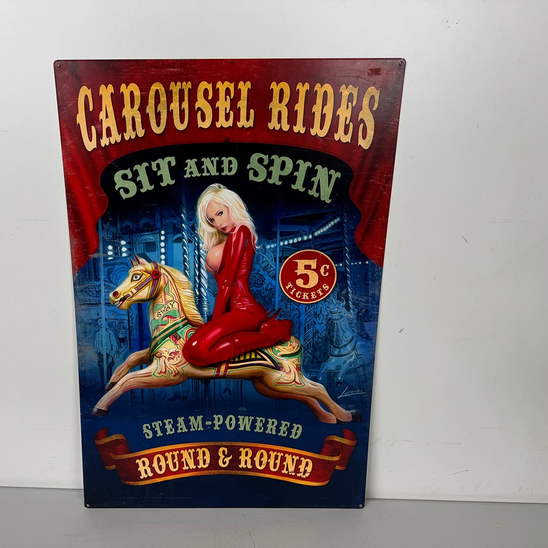 Lorenzo Sperlonga Artwork Erotic Pin-Up Girl Carousel Rides American 24 Gauge Steel Sign: Carousel Rides steel sign featuring erotic pin-up artwork by Italian-born artist Lorenzo Sperlonga. Unlike typical tin signs, this piece is crafted in the United States using 24-gauge American steel a
