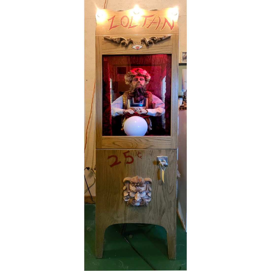Zoltan 25 Cent Fortune Teller Arcade Machine: Zoltan 25 cent fortune teller arcade machine. The game features a fortune teller figure with rocking motion and light-up eyes, that reads the user their fortune, rather than giving a fortune card. The