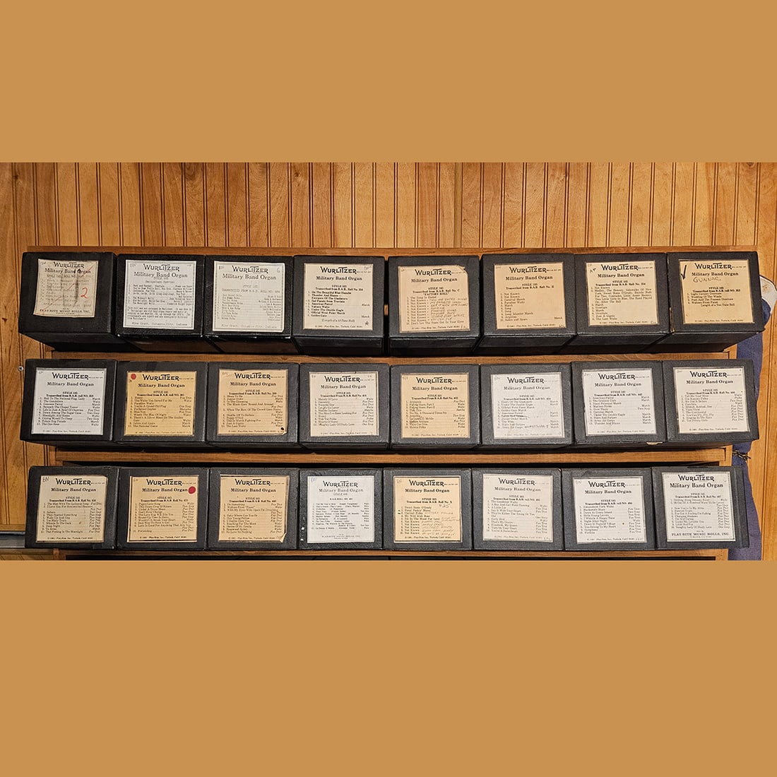 Lot of 24 Wurlitzer Military Band Organ Style 165 Music Rolls: Lot of 24 Wurlitzer Military Band Organ Style 165 music rolls in various conditions, some original, some reproductions. The rolls come in boxes of 11 x 12 x 26 cm in size. Dimensions (H x W x D): 11 x