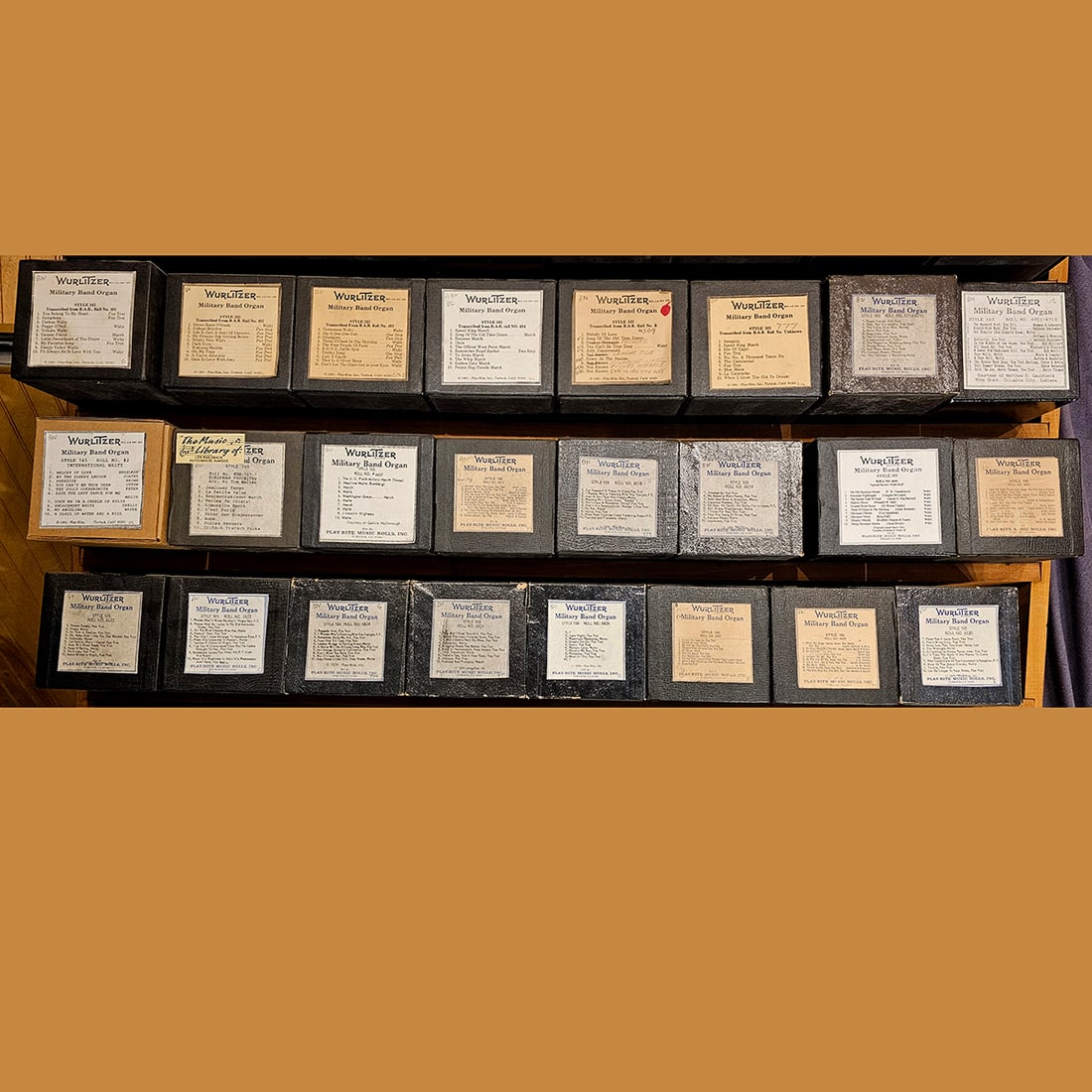 Lot of 24 Wurlitzer Military Band Organ Style 165 Music Rolls: Lot of 24 Wurlitzer Military Band Organ Style 165 music rolls in various conditions, some original, some reproductions. The rolls come in boxes of 11 x 12 x 26 cm in size. Dimensions (H x W x D): 11 x