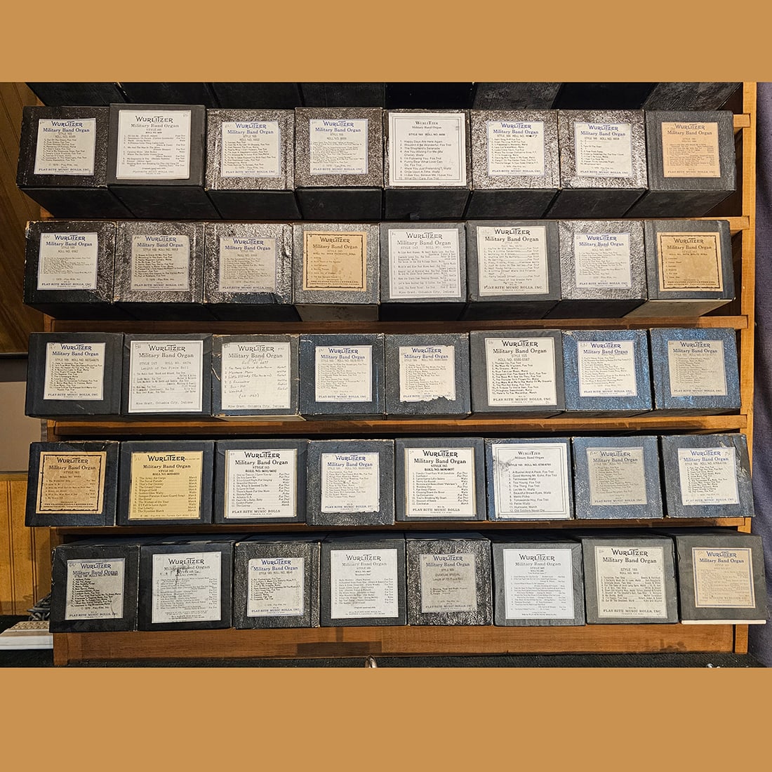 Lot of 32 Wurlitzer Military Band Organ Style 165 Music Rolls: Lot of 32 Wurlitzer Military Band Organ Style 165 music rolls in various conditions, some original, some reproductions. The rolls come in boxes of 11 x 12 x 26 cm in size. Dimensions (H x W x D): 11 x