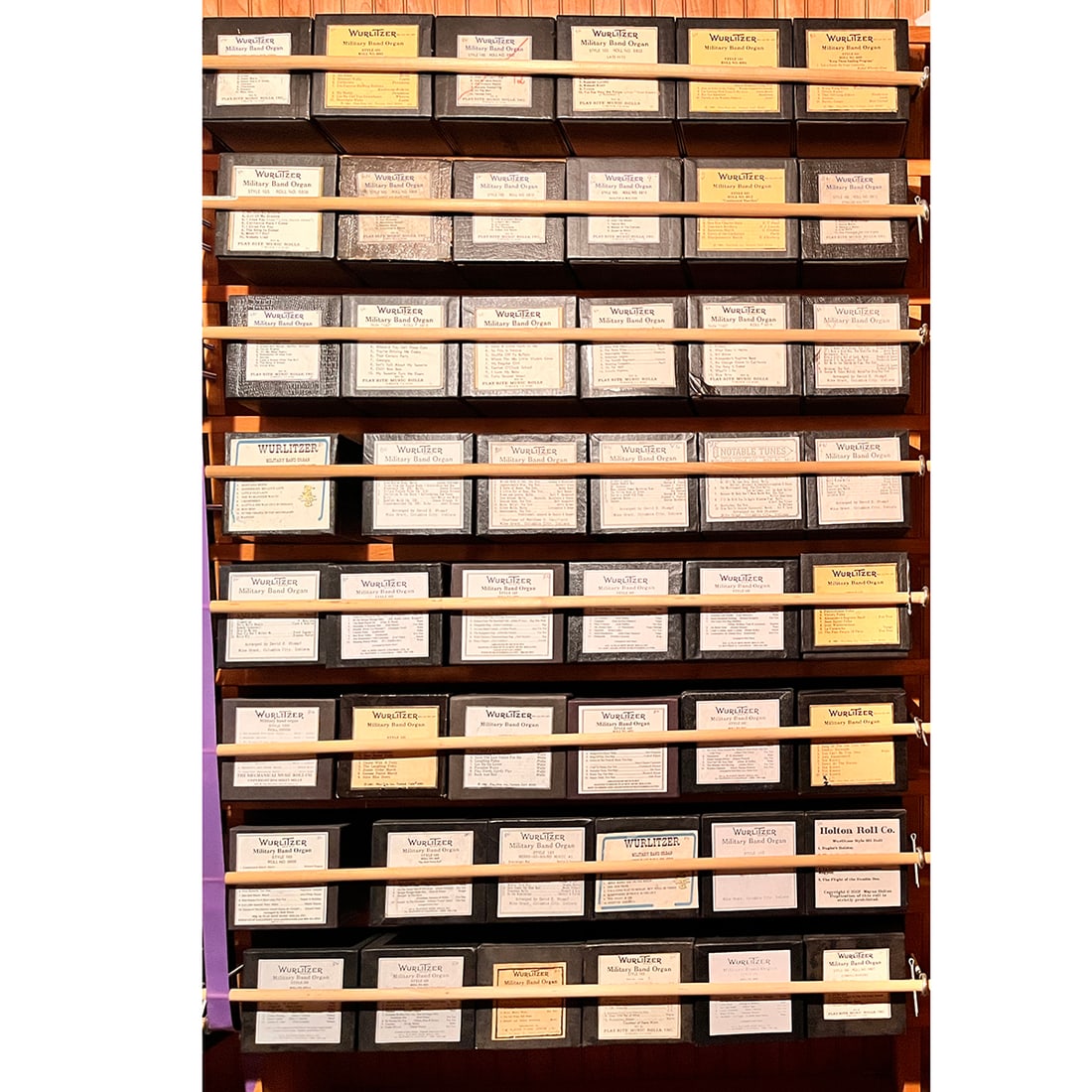 Lot of 48 Wurlitzer Style 165 Military Band Organ Music Rolls: Lot of 48 Wurlitzer Military Band Organ Style 165 music rolls in various conditions, some original, some reproductions. The rolls come in boxes of 11 x 12 x 26 cm in size. Dimensions (H x W x D): 11 x