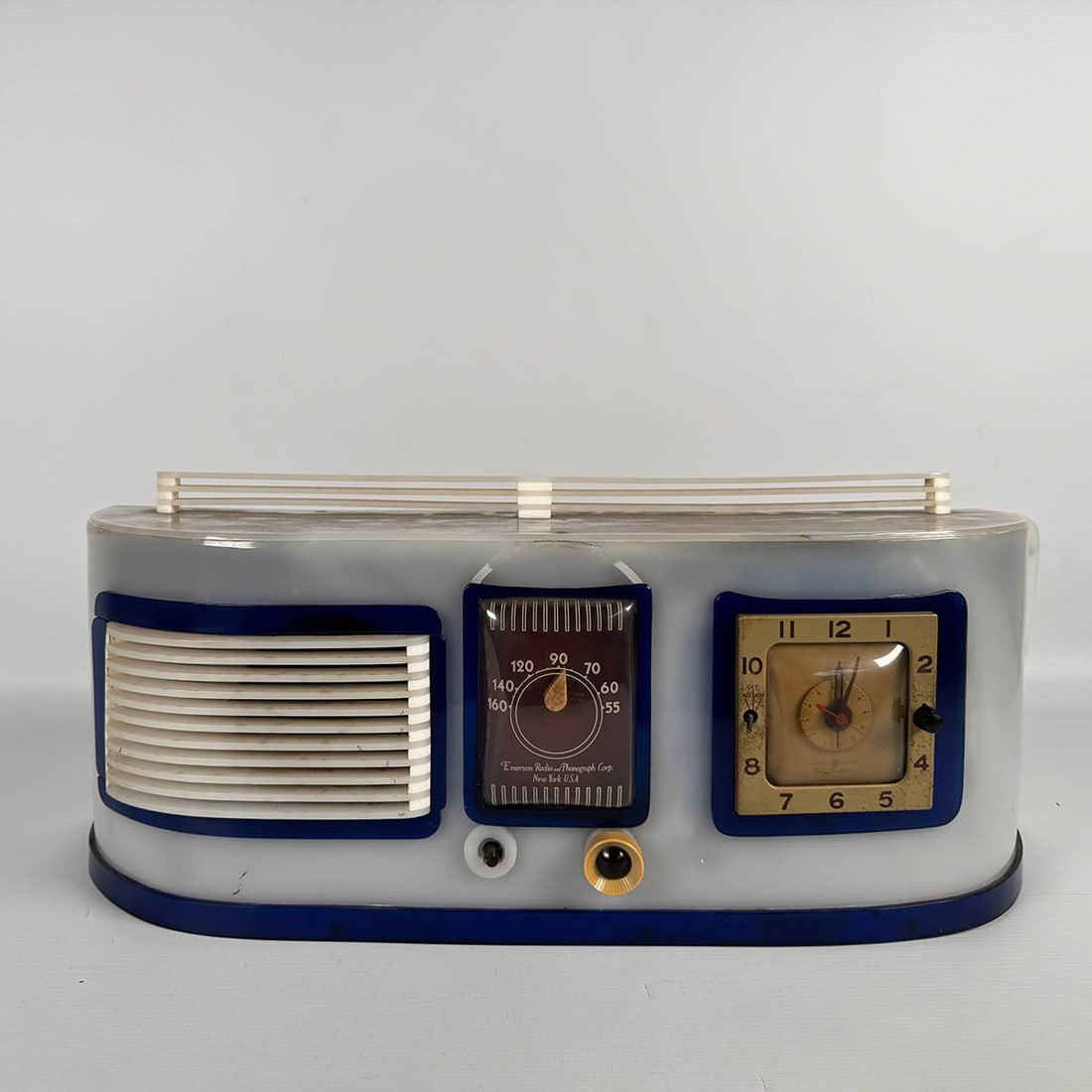 Custom Radio Case with Emerson Radio and Phonograph Corp. Radio and General Electric Clock: Custom acrylic and wood radio case with radio produced by Emerson Radio and Phonograph Corp., New York, USA and a clock produced by General Electric, USA. Fair visual condition, the case is missing a