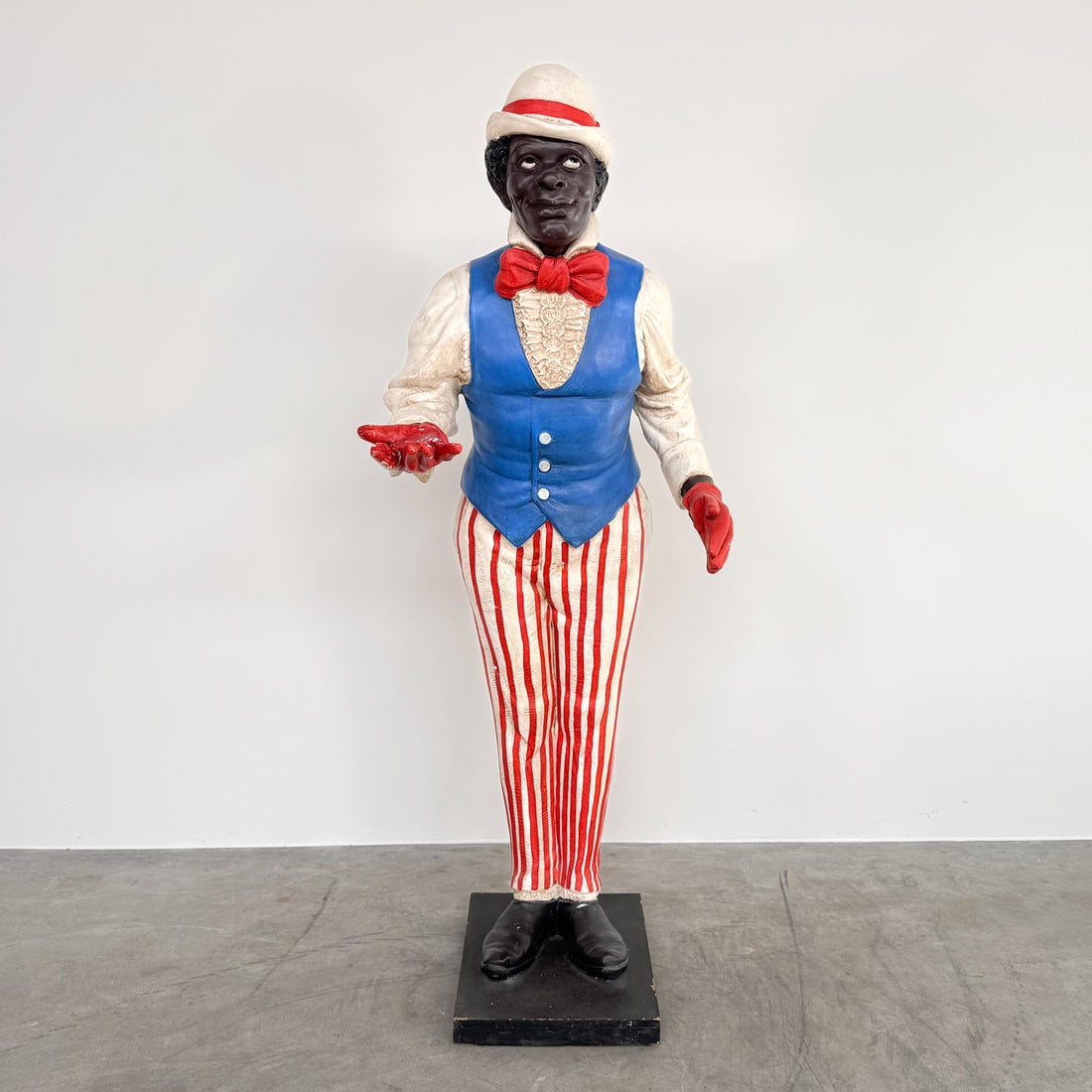 Lifesize Vintage Butler Plaster Statue: Lifesize vintage butler plaster statue. Very nicely detailed with a nice paintwork, but the right hand shows repairs on a previously broken index finger, minor color loss in other spots. Dimensions (H