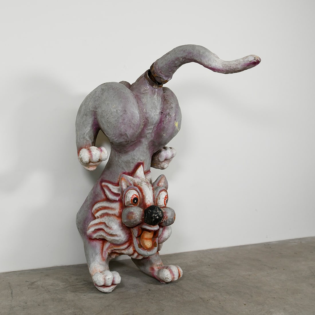 Vintage Fiberglass Carnival Sculpture of Lion Like Creature in Gray, White and Red: This sculpture depicts a stylized, lion-like creature and features a distinct folk-art or vintage carnival aesthetic. Close-up details reveal a weathered fiberglass construction with visible glass-mat