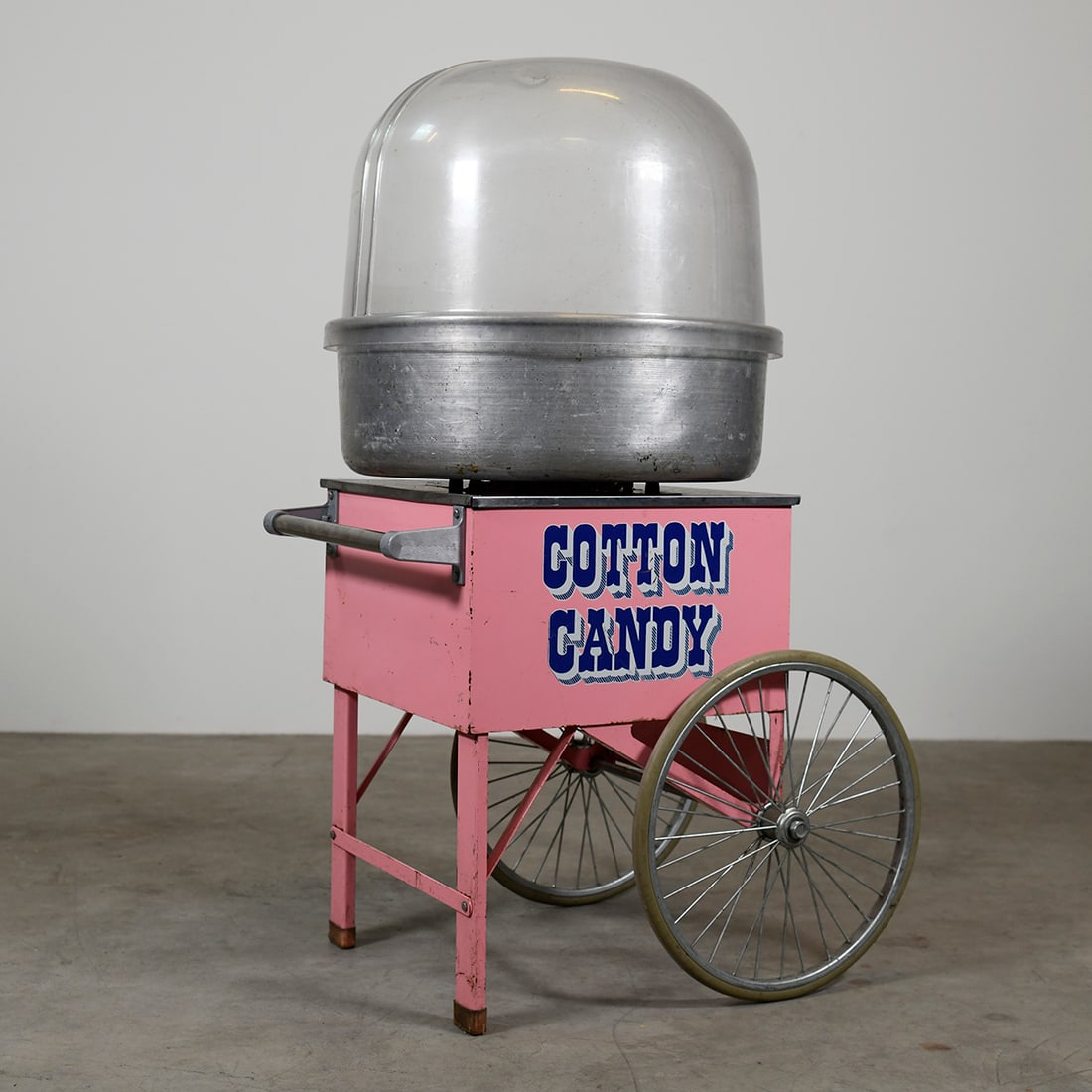 Gold Medal Floss Boss Cotton Candy Machine with Cart: Floss Boss cotton candy machine by Gold Medal including cotton candy cart with large wheels. Cotton candy machine with heat control thermostat and aluminium bowl with half wind hood. Comes with cotton