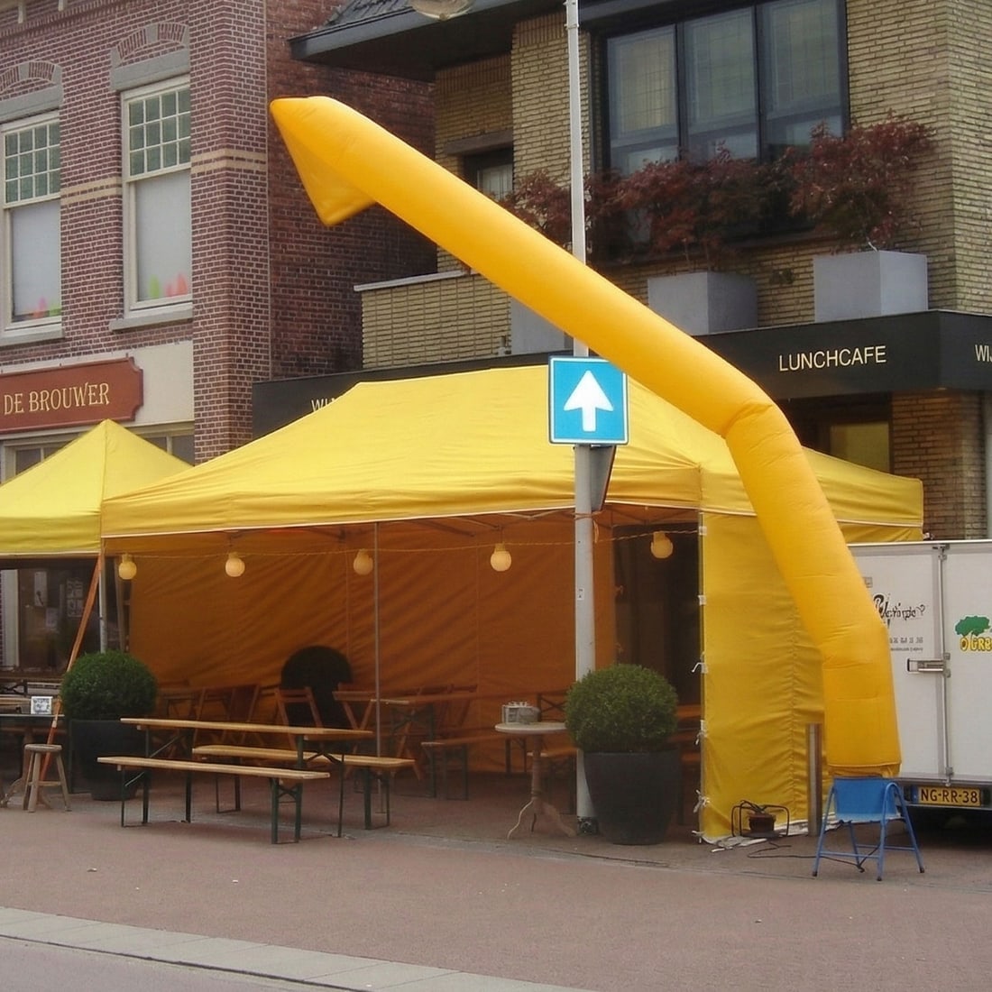 Yellow Professional-grade 3 x 6 m Steel Tent with Side Walls and Rain Cover: This yellow professional-grade 3 x 6 m steel tent is a heavy-duty event structure designed for high visibility and reliable shelter. Stored in a protective grey cover for easier transport. Included in