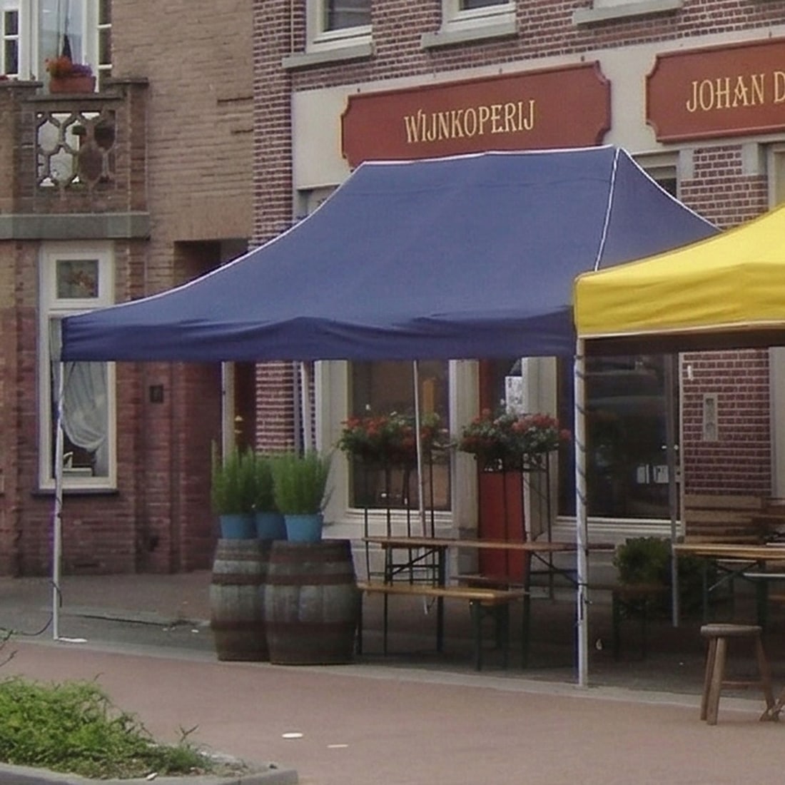 Blue Professional-grade 3 x 6 m Steel Tent with 10 Side Walls: This blue professional-grade 3 x 6 m steel tent is a heavy-duty event structure designed for reliable shelter. Stored in a protective blue cover for easier transport. A total of 10 side walls come inc