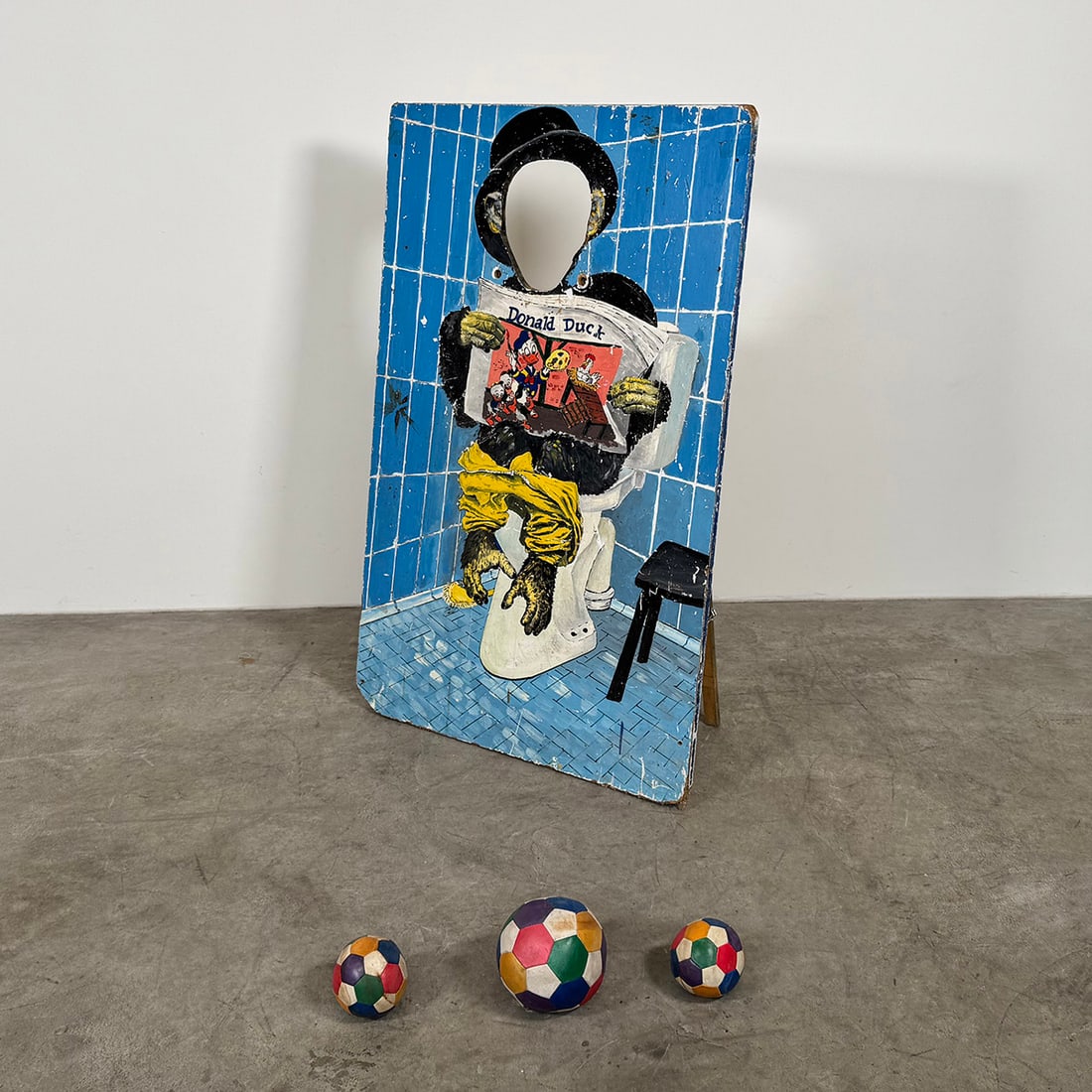 Wooden "Hit the Monkey" Skill Tossing Game with 3 Soft Balls: The "Hit the Monkey" game is a classic carnival-style skill attraction that comes with three soft balls designed for tossing at a target. The goal of the game is to hit the removable face panel making