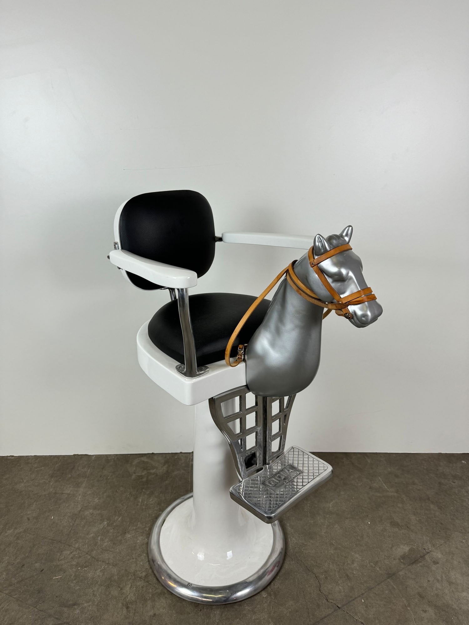 Restored Italian Children's Barber Chair "Gioia Catania": Children's barber chair made by "Gioia Catania" Italy. Recently restored in 2023, in excellent condition. Dimensions (H x W x D): 107 x 48 x 55 cm. Condition: Very Good. Location: The Netherlands,