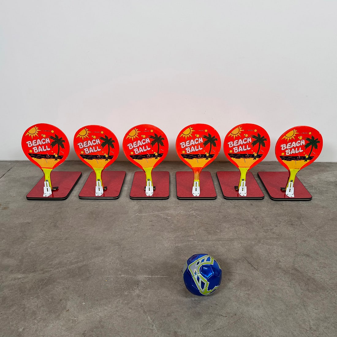 Fairground Football Skill Game with 6 "Beach Ball" Paddles and a Football Ball: Fairground football skill game with 6 "Beach Ball" paddles and a football ball. The goal of the player is to knock down all of the "Beach Ball" paddles by hitting them with a football ball. Very good