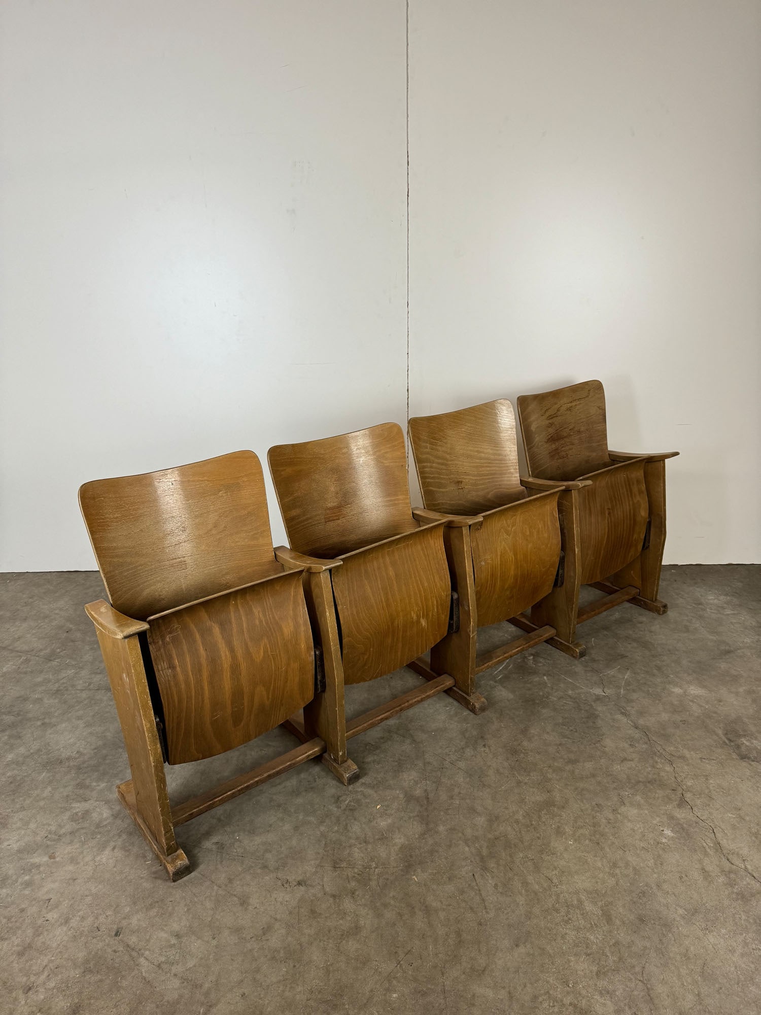 Vintage Wooden Cinema Four-Seater Bench: Vintage Wooden Cinema Four-Seater Bench. Functional in a good original visual condition. Dimensions (H x W x D): 86 x 207 x 60 cm. Condition: Good. Location: The Netherlands, Tilburg.