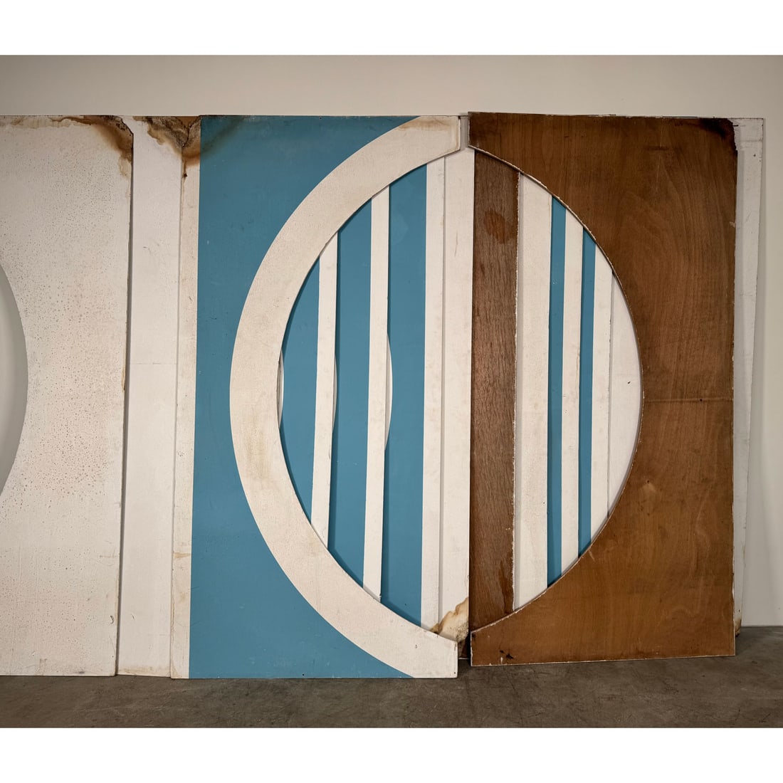 17 arches Oriental temple: Set of 17 decorative arch panels from an Oriental temple–style attraction or stage decoration. Painted wooden panels with striped patterns and curved arch shapes, suitable for fairground scenery, th