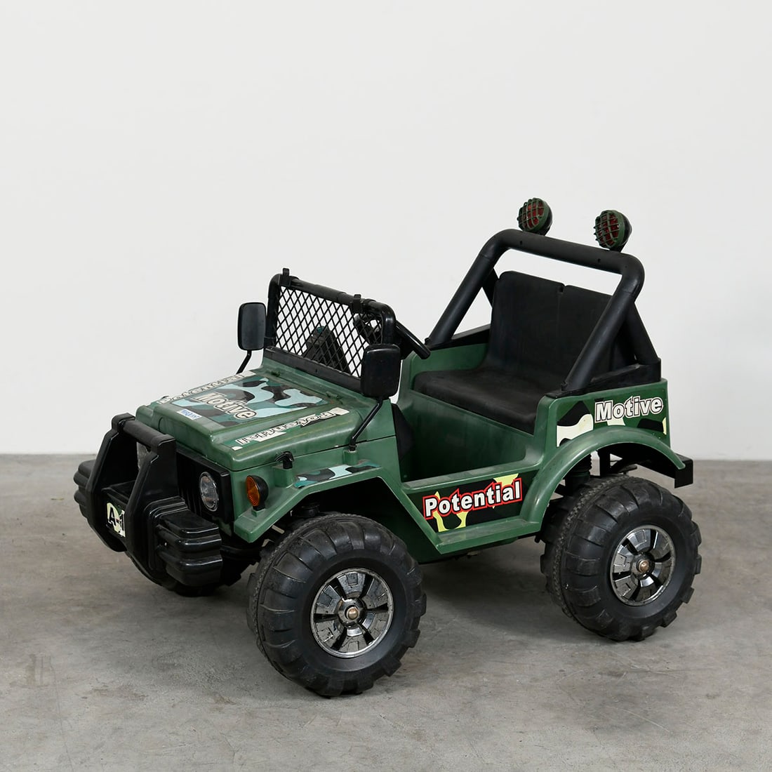 Marquant "Motive" Electric Children's Jeep with New Batteries and a Plug-in Charger: The Marquant "Motive" electric children’s jeep, modeled after military aesthetic, has recently been updated with fresh batteries and an included plug-in charger. The jeep is in very good visual and