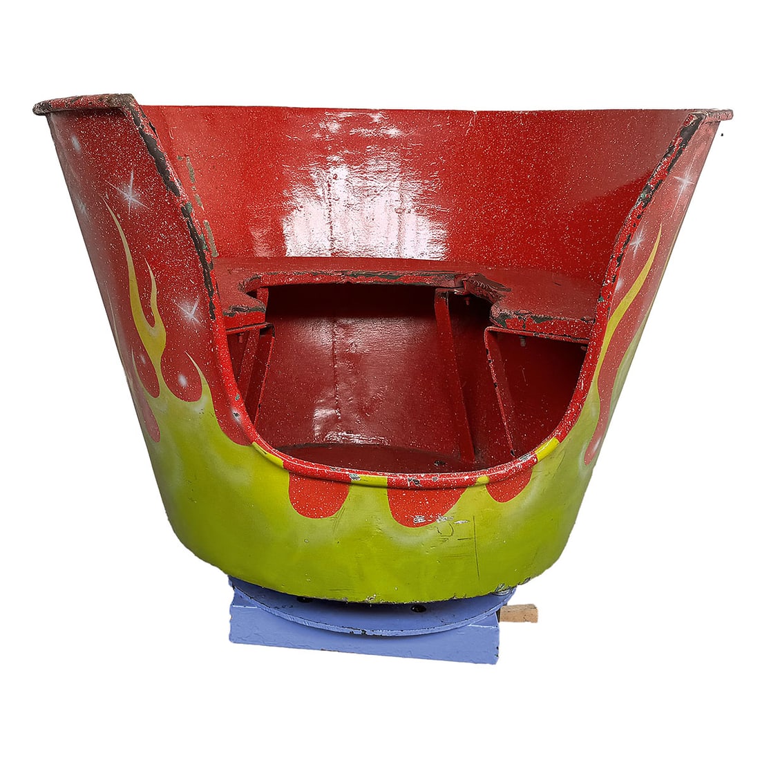 Spinning Carousel "Teacup Ride" with Flame Theme: Vintage spinning carousel "Teacup Ride" with flame theme. The metal body of this carousel ride features the iconic teacup shape and a three piece wooden bench that could seat up to three children. Goo