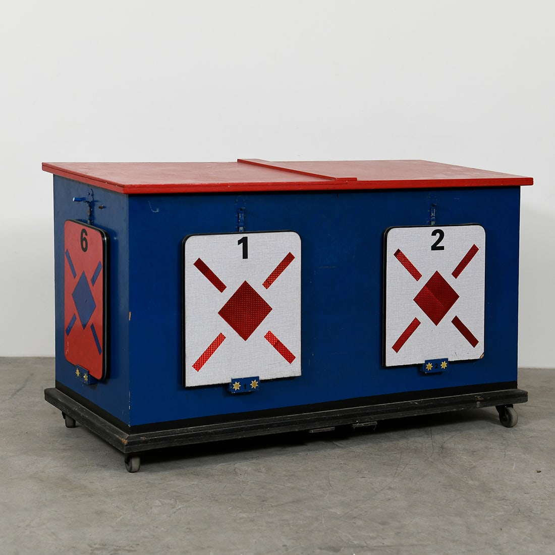 "Disappearing Cube" Animal or Object Production Box Illusion: "Disappearing Cube" animal or object production box illusion. A chest with 6 removable doors and a large cube is shown to the spectators. The doors are removed from the chest to show that it is fully