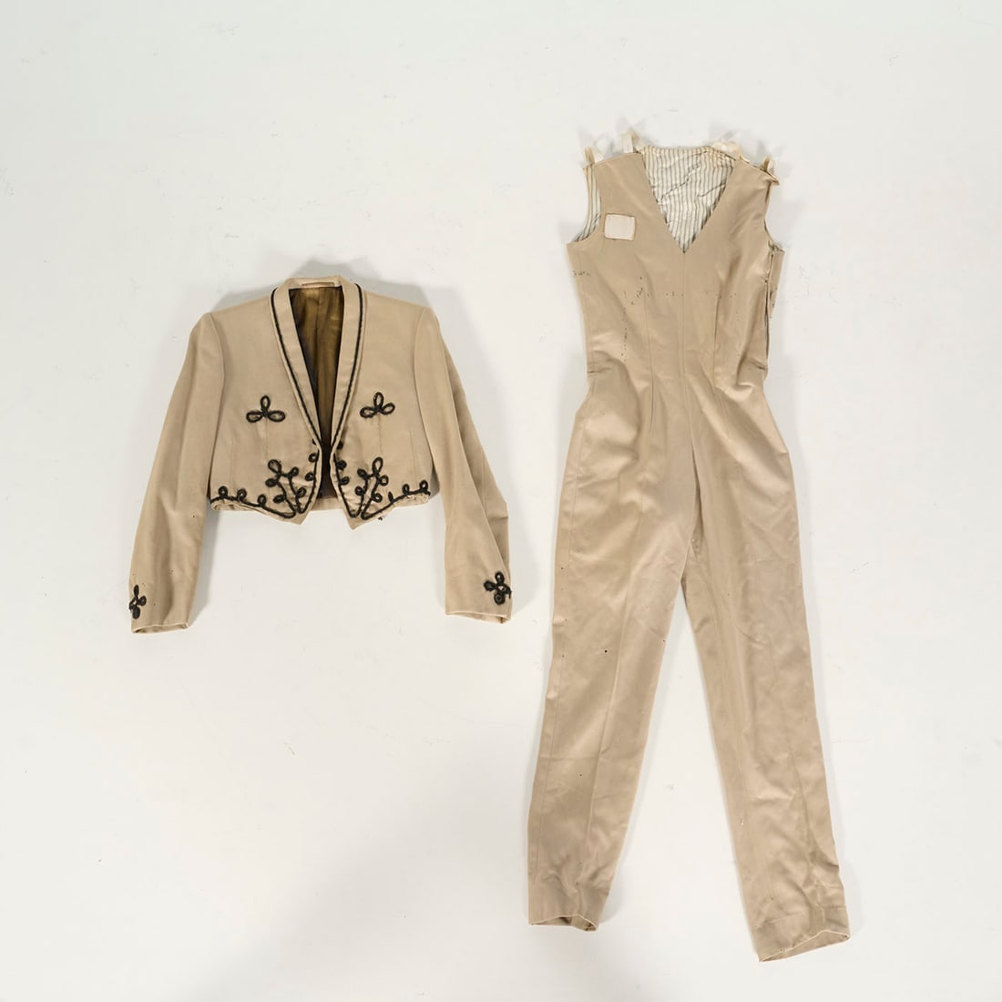 Original Costume Used by Royce to Perform with the Large and Small Unfolding Fan Magic Props in 1974: Original costume used by Royce to perform with the large and small unfolding fan magic props in 1974. Royce's early costumes are smaller measuring around narrow 40/42 size. Please use our provided ima