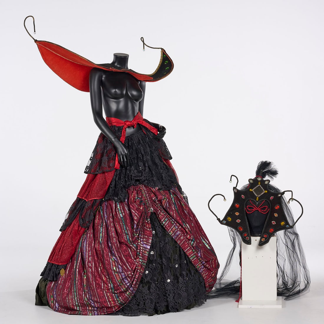 Original "Queen of the Night" Walking Act (ca. 1986) from the Royce Collection: Original "Queen of the Night" walking act (ca. 1986) from the Royce Collection. This theatrical costume consists of a multi-tiered skirt featuring alternating layers of black lace and red fabric, pair
