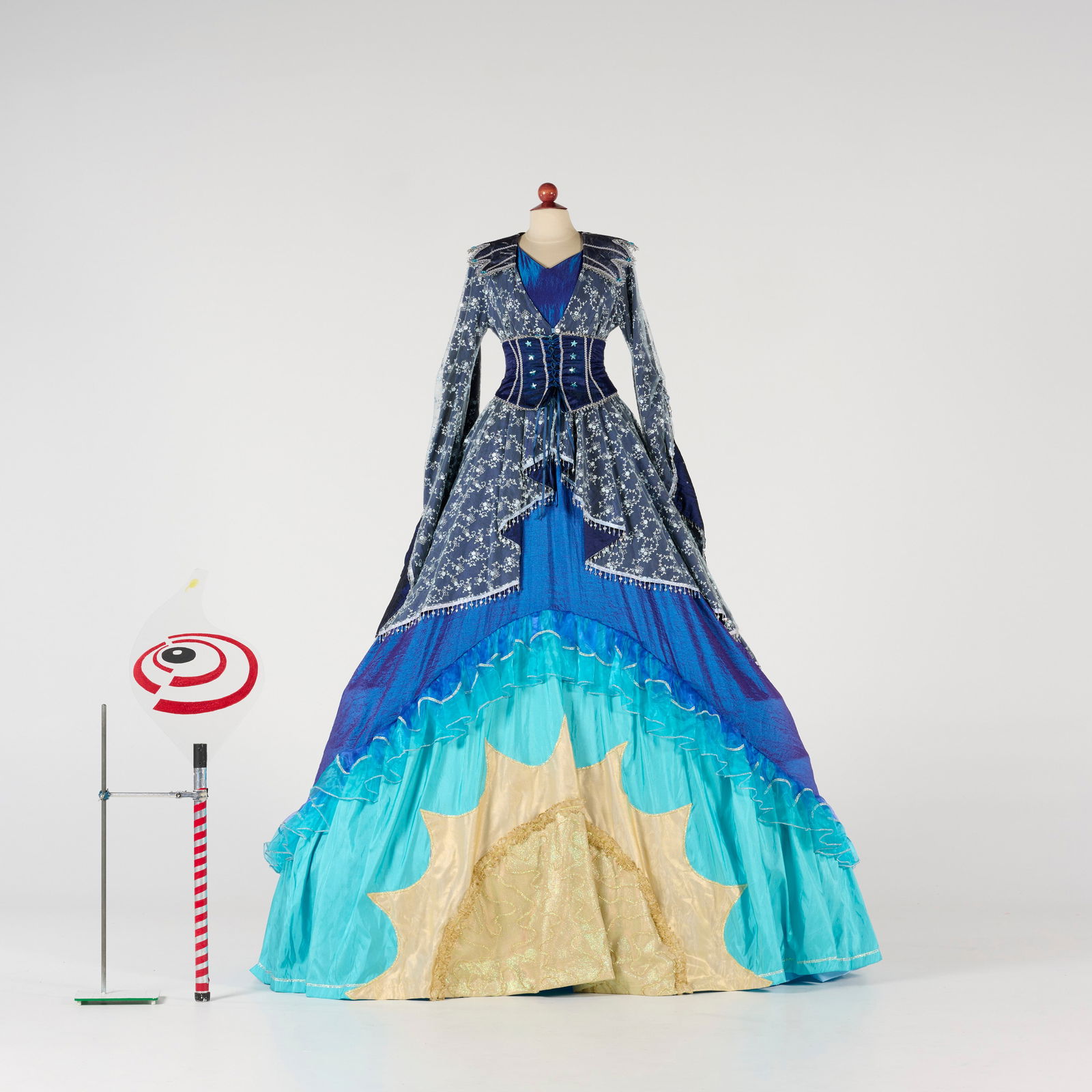 Original "Ice Queen" Stilt Act Costume from the Royce Collection: Original "Ice Queen" stilt act costume from the Royce Collection. Accompanying the ensemble are three delicate, glitter-covered butterfly hair clips embellished with faux gemstones and a red-and-white