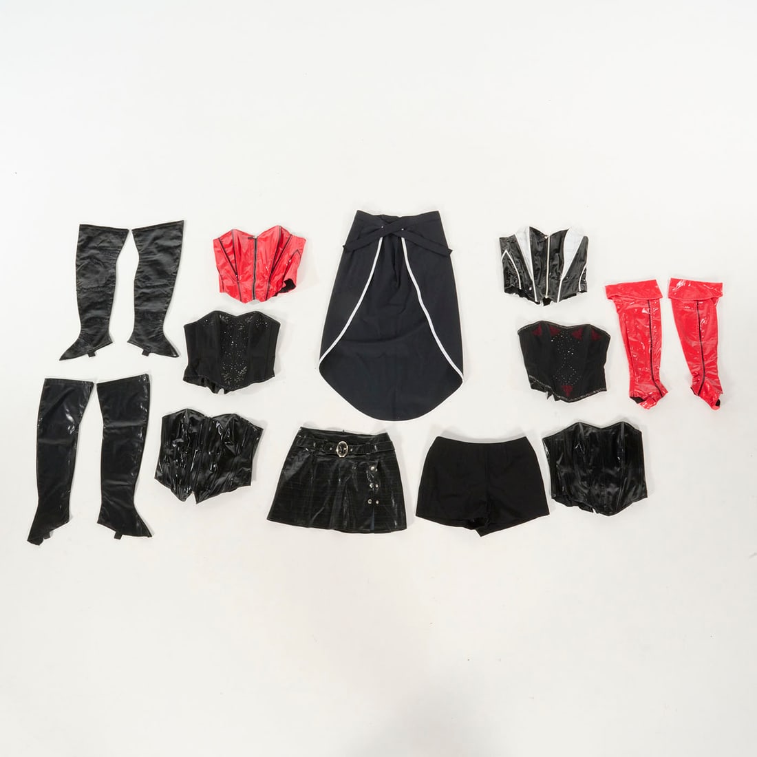 Lot of Various Costume Pieces - 6 Corsets, 3 Pairs of Leg Covers, 2 Skirts and 1 Pair of Shorts: Lot of various costume pieces from the Royce Collection - 6 corsets, 3 pairs of leg covers, long skirt, mini-skirt and a pair of shorts. Please use our provided images to judge the condition. Location