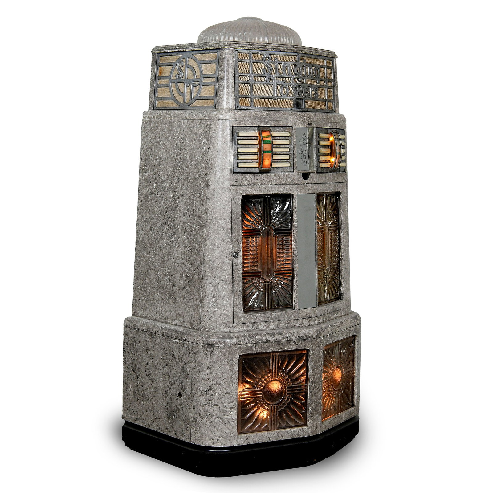 AMI Singing Towers Series 100 Jukebox (1939-1942): AMI Singing Towers Series 100 Jukebox (1939-1942). The Singing Towers Jukebox features a marbelized grey and white cabinet finish with a black base, illuminated decorative glass panels, and a fluted t