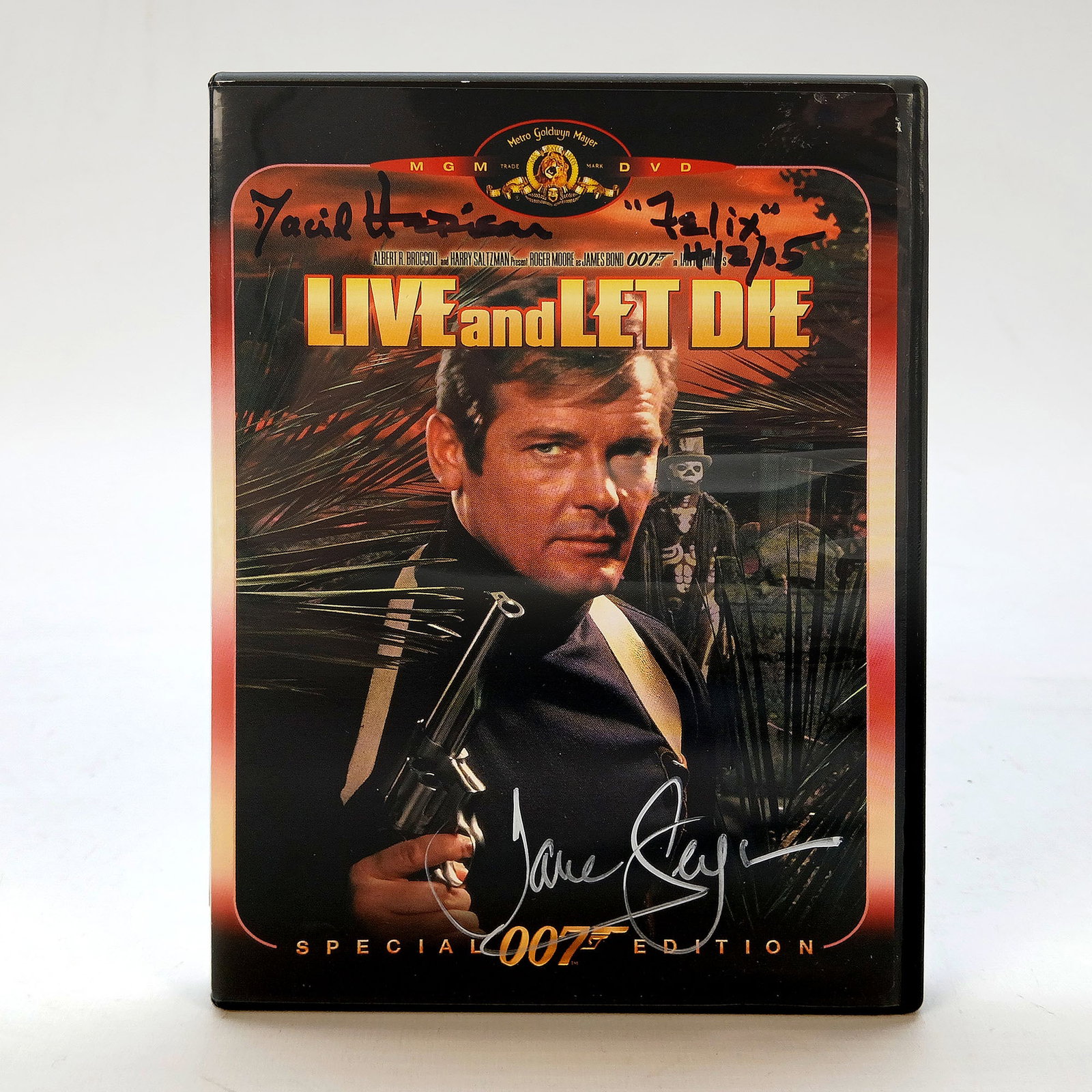 "Live and Let Die" James Bond Special 007 Edition DVD Signed by David Hedison and Jane Seymour: "Live and Let Die" James Bond Special 007 Edition DVD Signed by David Hedison and Jane Seymour. Dimensions (H x W x D): 19 x 13,5 x 1,4 cm. Location: The Netherlands, Tilburg.
