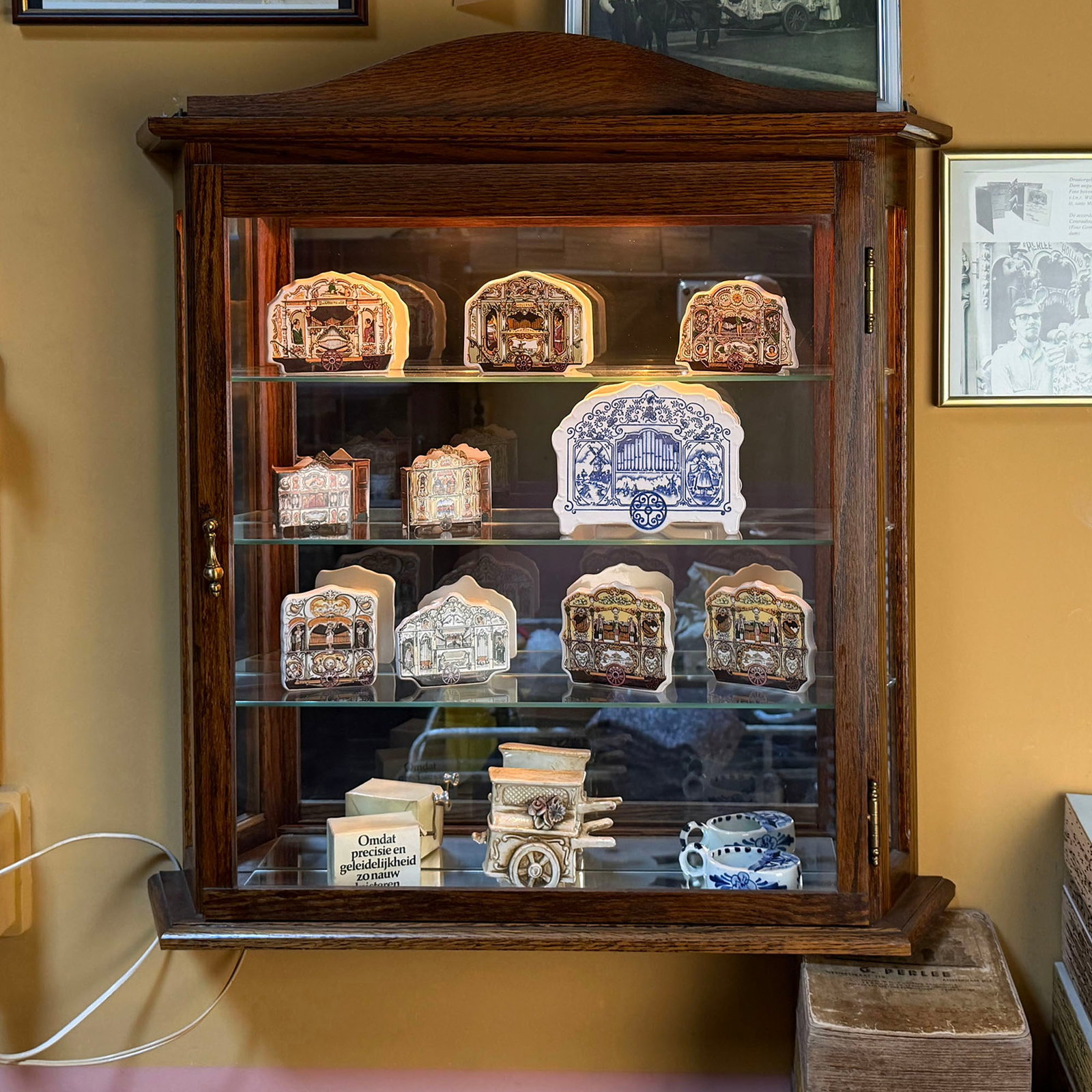 Wooden Wall Cabinet with Light Containing Various Organ Collectibles from the G. Perlee Collection (1 of 5)