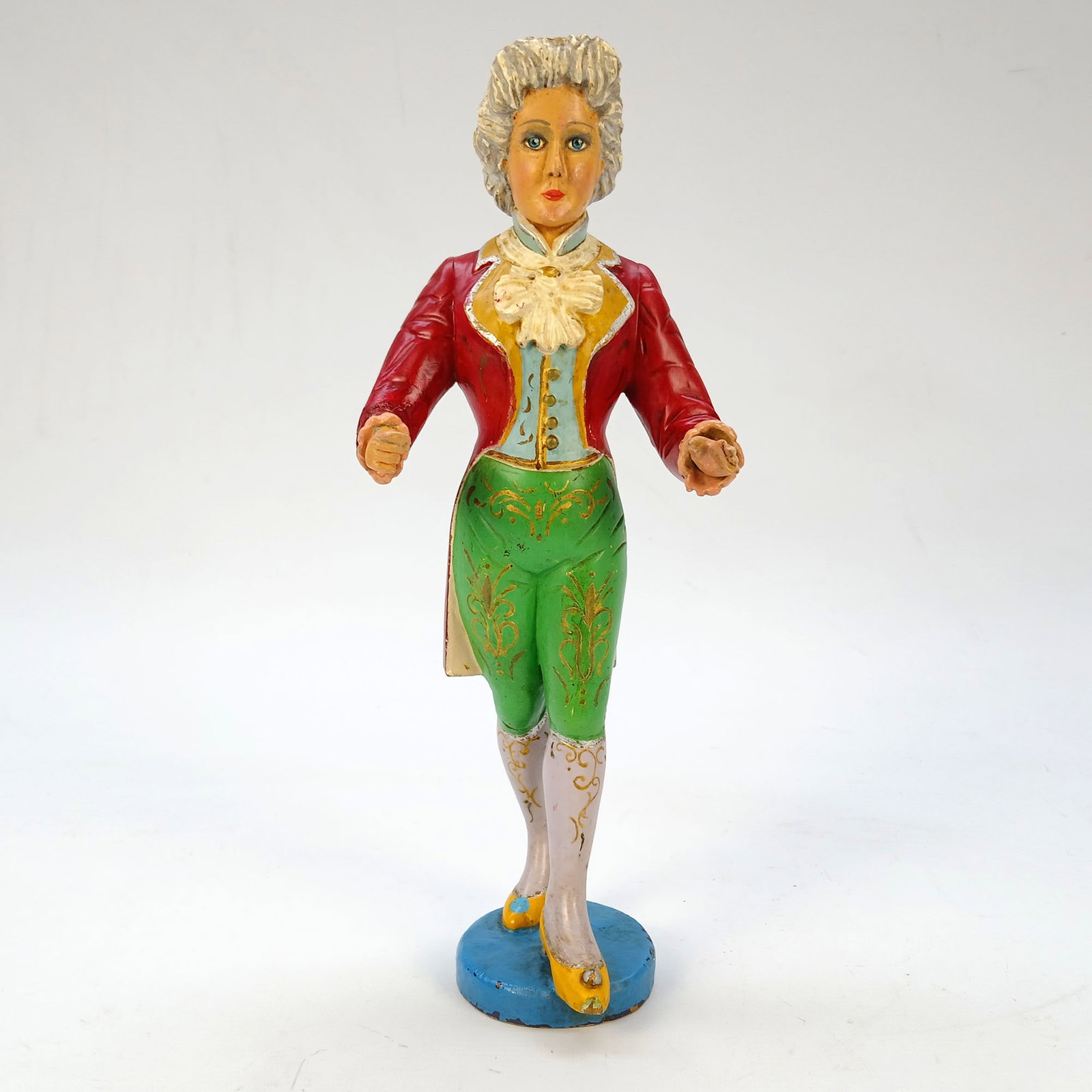Miniature Wooden Organ Figure by Peter Smiesing: This hand-painted wooden organ figure by Peter Smiesing, depicts an 18th-century gentleman dressed in period attire. Evidence of its function as a mechanical organ figure is clear from the vertical op