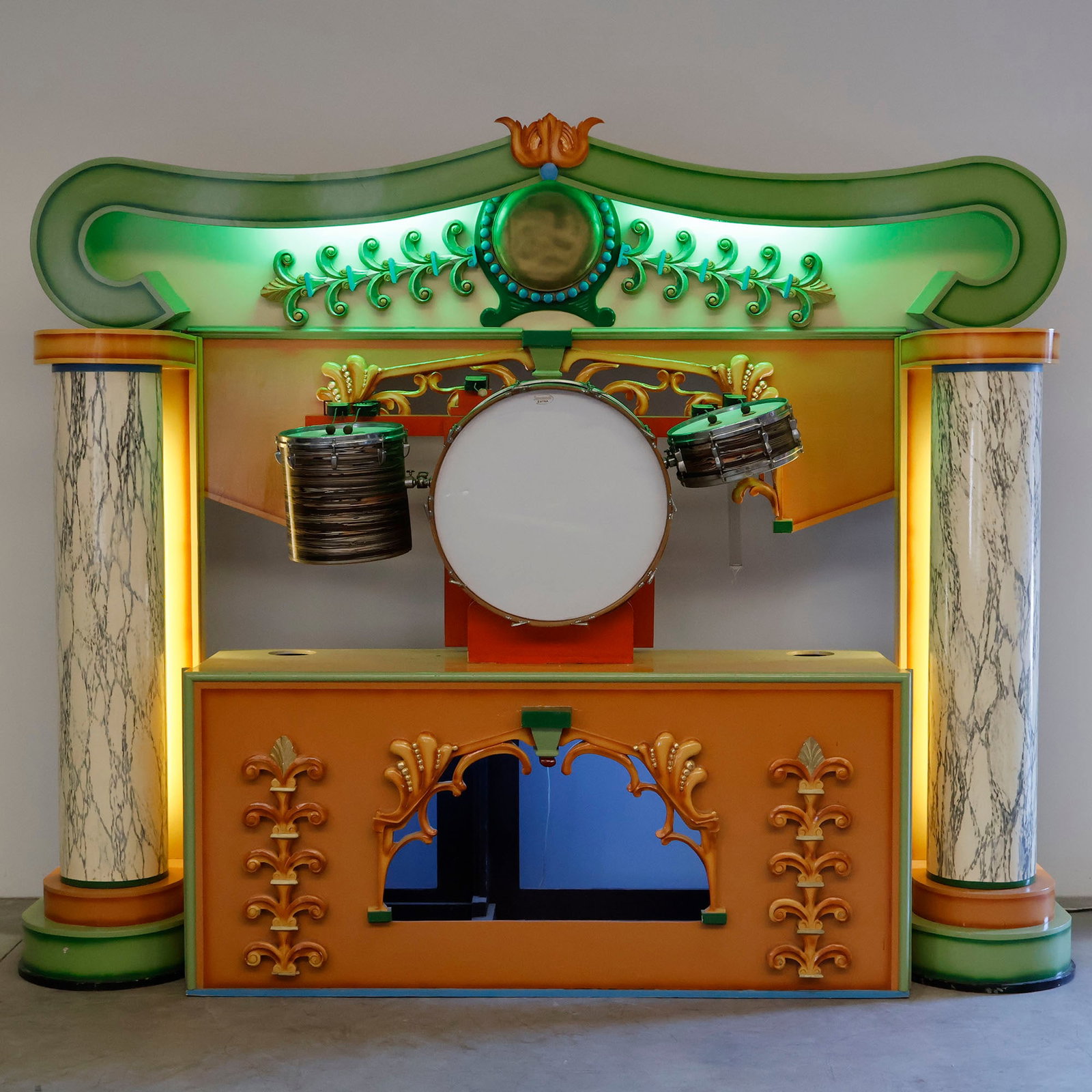 Vintage Art Deco-style Decap Oran Facade with Working Lights: This vintage Art Deco-style wooden organ facade produced by Decap features an integrated canopy with green internal illumination, flanked by two large faux-marble painted columns and accented with car