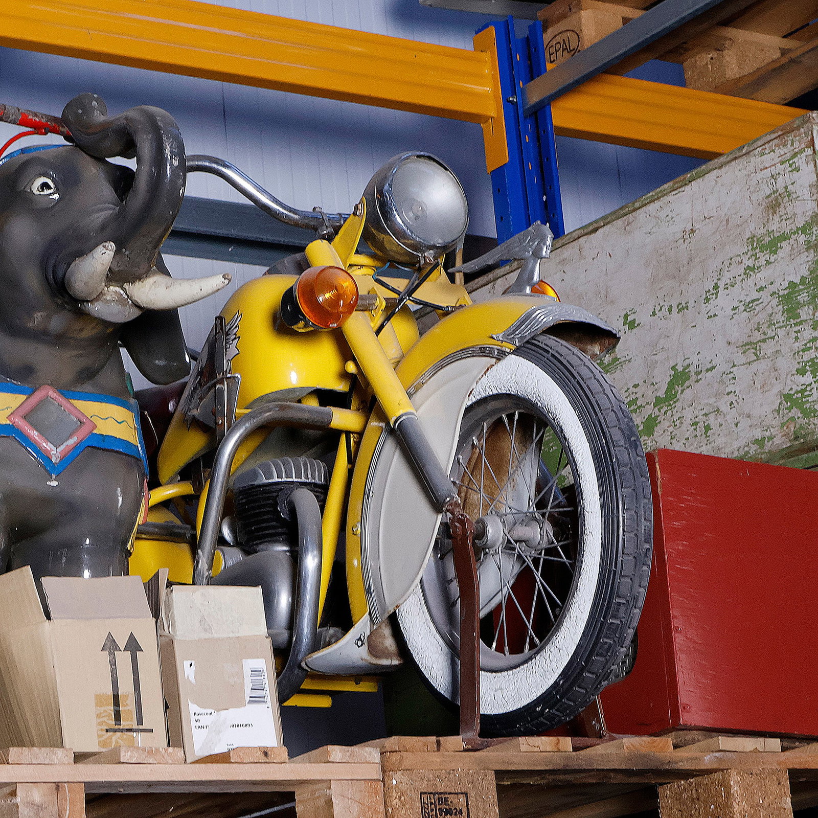 Lennaerts Carousel Motorbike - Vintage Fairground Motorcycle: Vintage Lennaerts carousel motorbike, made as a ride vehicle for a children's carousel. Designed as an impressive full-size-style touring motorcycle, finished in yellow and silver with extensive chrom