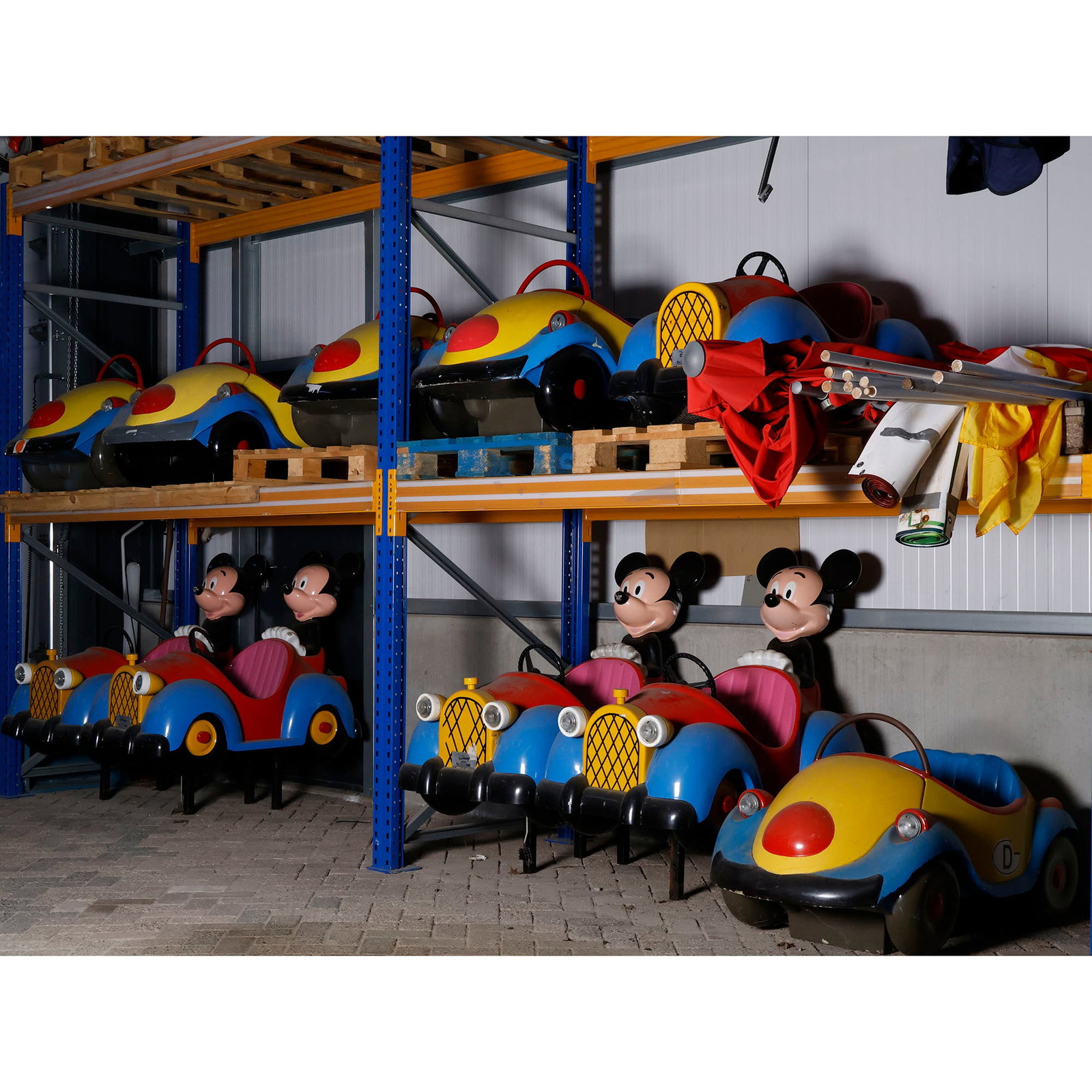 Lot of five original EMT carousel vehicles / kiddie ride cars, Germany , Elektro-Mobiltechnik (EMT).: The group consists of four EMT Mickey Mouse Cars, dating from approximately 1990, together with one EMT Phantasy Car dating from 1997. The Mickey Mouse Car was one of EMT's recognizable character-base