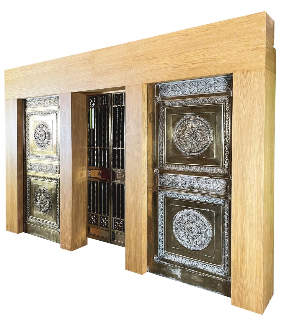 Solid Brass Lloyds Bank Doors ca. 1920s: 1920s, English, a stunning pair of double-sided Lloyds Bank of London doors, flanked by two solid brass decorative panels. These are great accent and decor pieces and could be repurposed for many uses