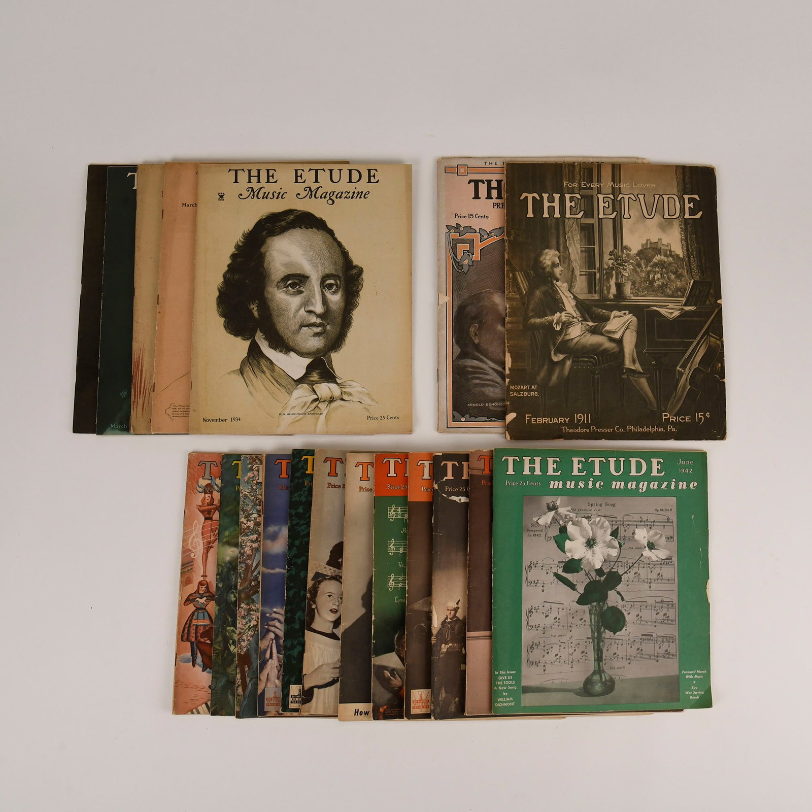 Collection of 18 Vintage Issues of The Etude Music Magazine: Collection of 18 vintage issues of The Etude Music Magazine, published by the Theodore Presser Co. in Philadelphia, spans from the early 1910s through the 1940s. Notable editions include February 1911