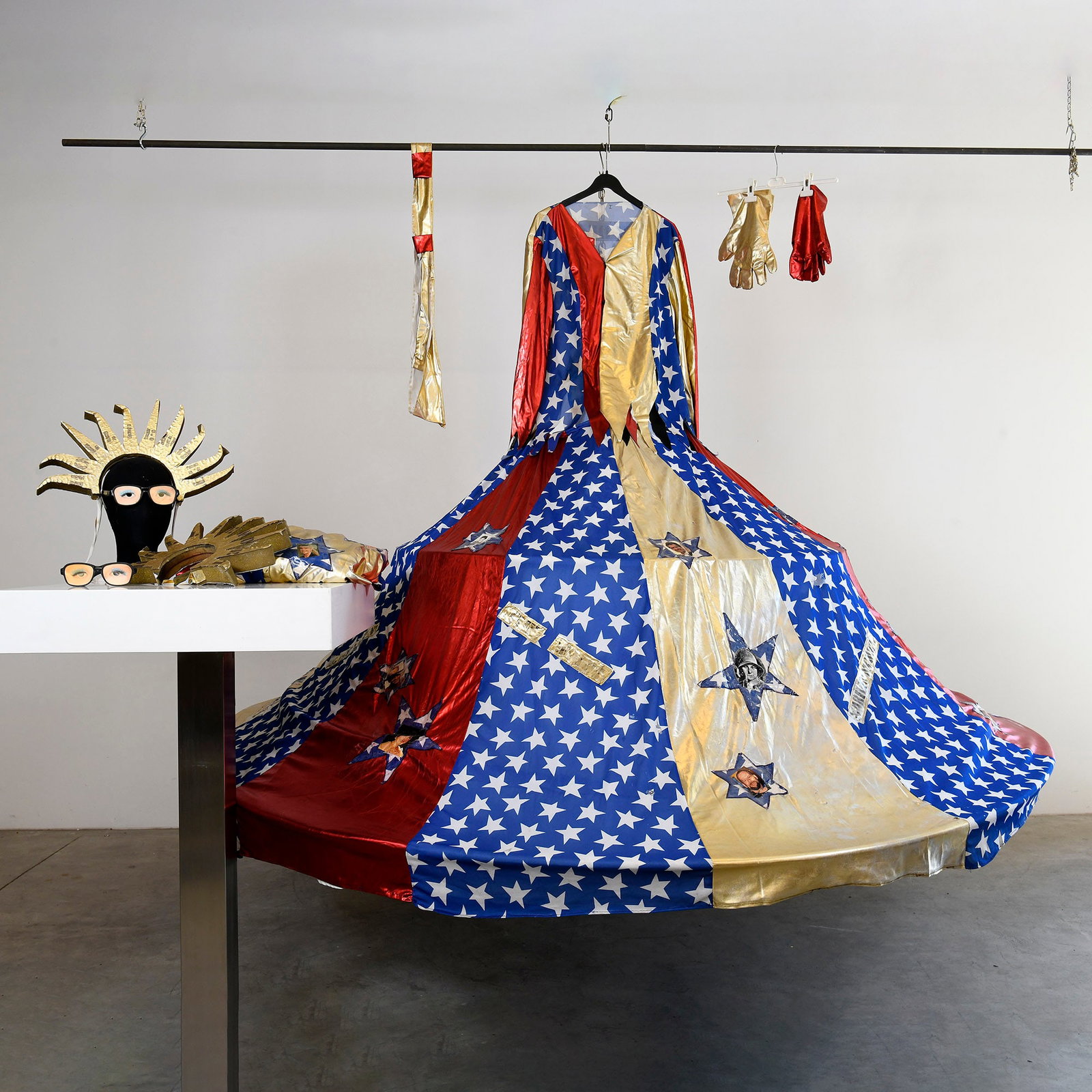 Lot of 2 America Theme Hoop Dresses with Accessories: Lot of 2 America theme hoop dresses with accessories - two sun-ray headpieces, a necktie or sash, and a pair of gloves. Only a single set of hoops, come included with the lot. The main garment is cons