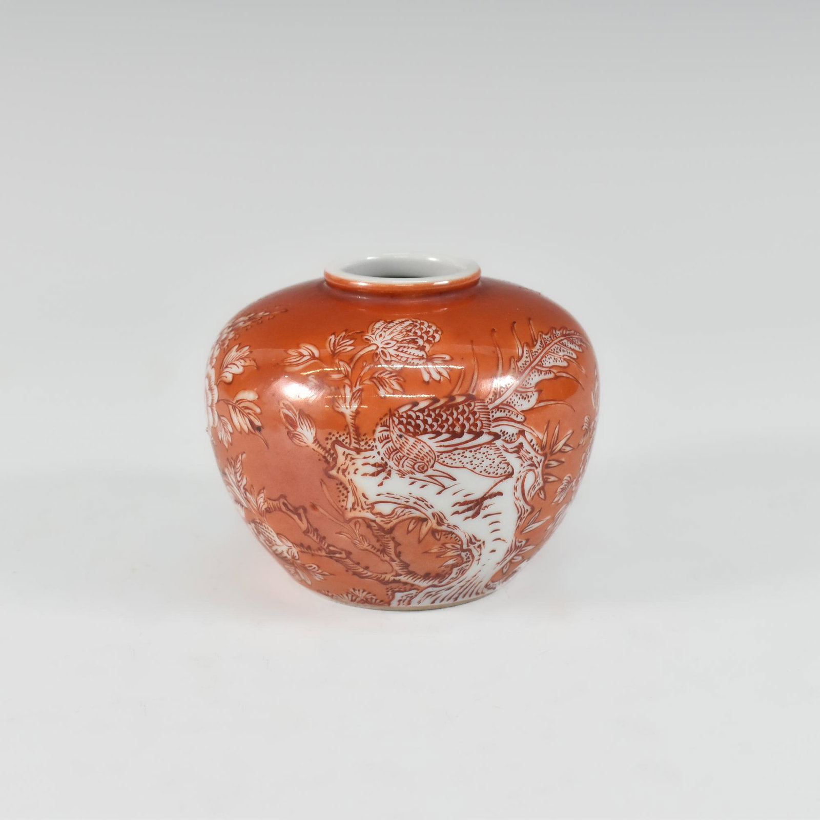A CHINESE CORAL RED PORCELAIN BRUSH WASH: Dimensions: H 3". Decorated With Flowers, The Base With Four-Character Mark