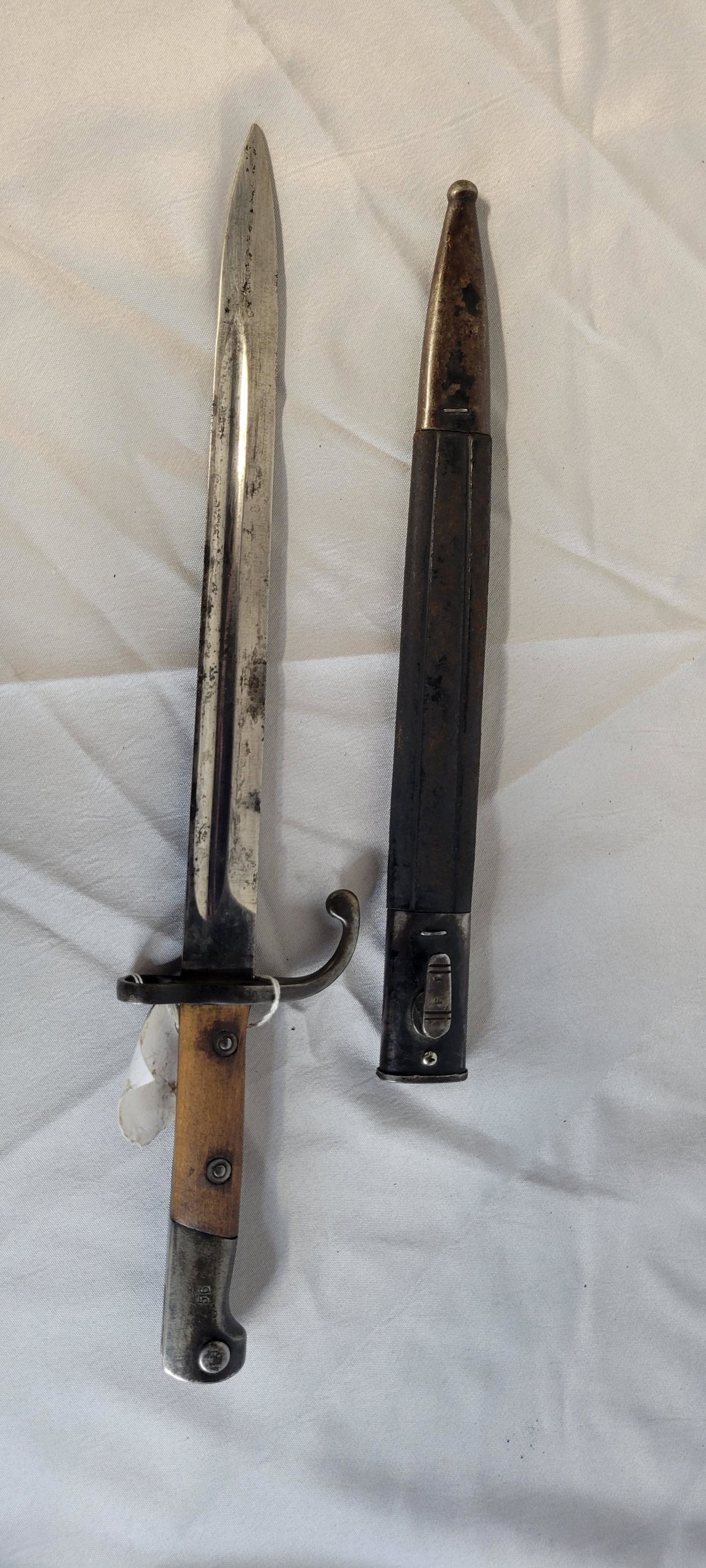 British Military Bayonet Marked 56 With Scabbard: British Military Bayonet Marked #-56. Maker is Prince-Smith & Stells, with Scabbard. AL