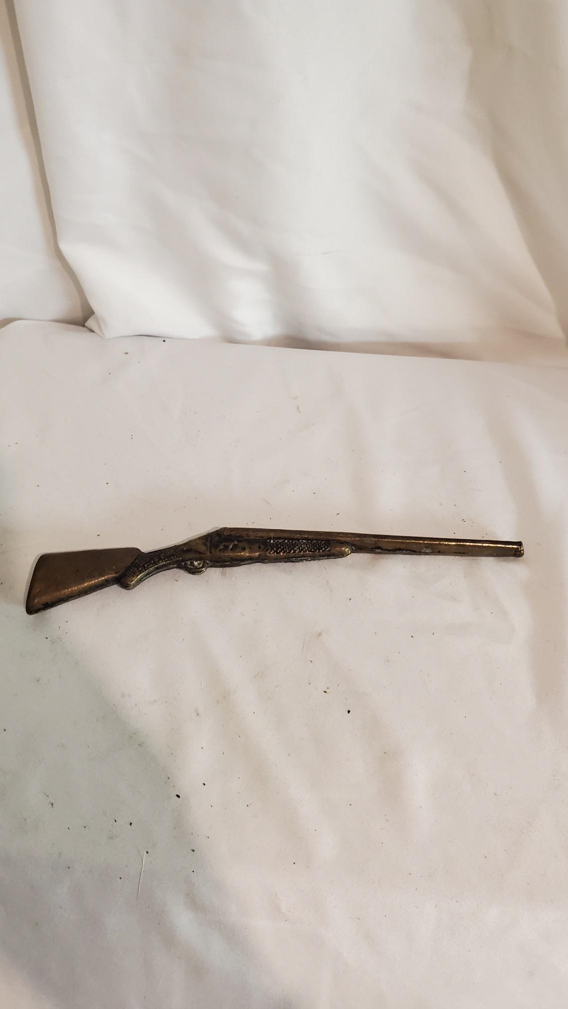 Small Solid Metal Rifle Desk Piece: Please refer to all photos to see condition, we will answer to the best of our ability any questions you may have.