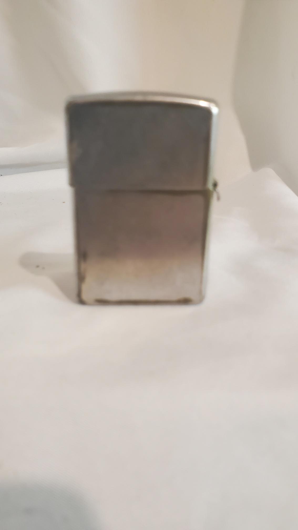 Zippo Lighter: Please refer to all photos to see condition, we will answer to the best of our ability any questions you may have.