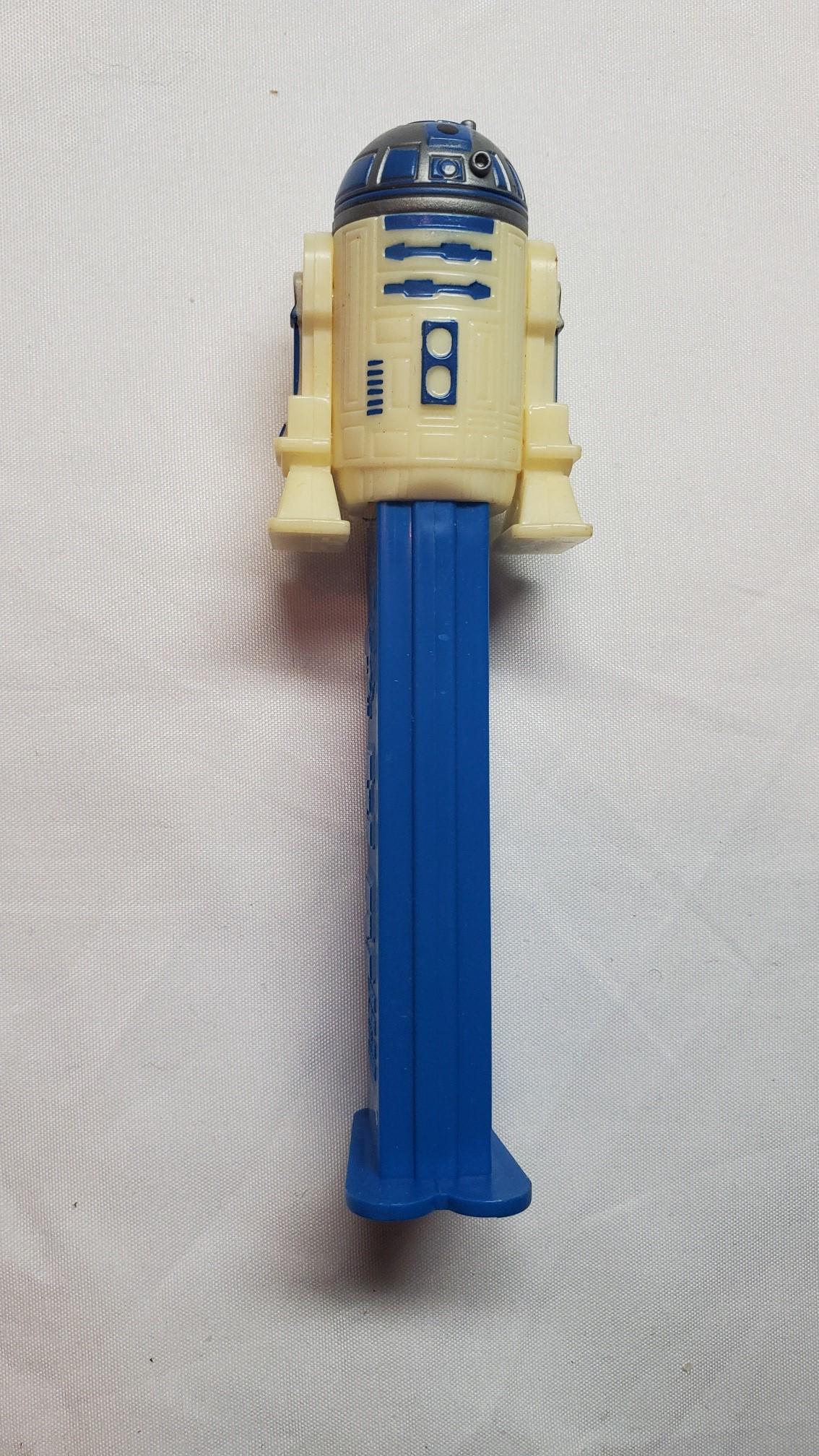 R 2 D 2 Pez Dispenser: Now I am not a collector of PEZ that said I DO NOT see this dispenser around. Please refer to all photos to see condition, we will answer to the best of our ability any questions you may have.