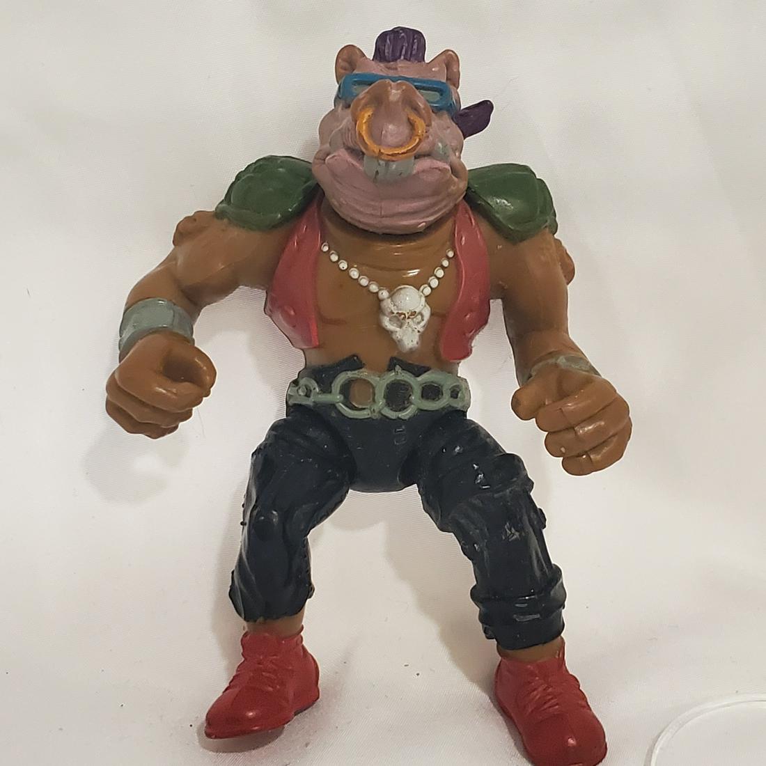 Teenage Mutant Ninja Turtle Bebop Character: Please read carefully. Description given is based on opinion unless otherwise documented. We ask that you look at pictures carefully before bidding. We are more than happy to take more pictures or ans