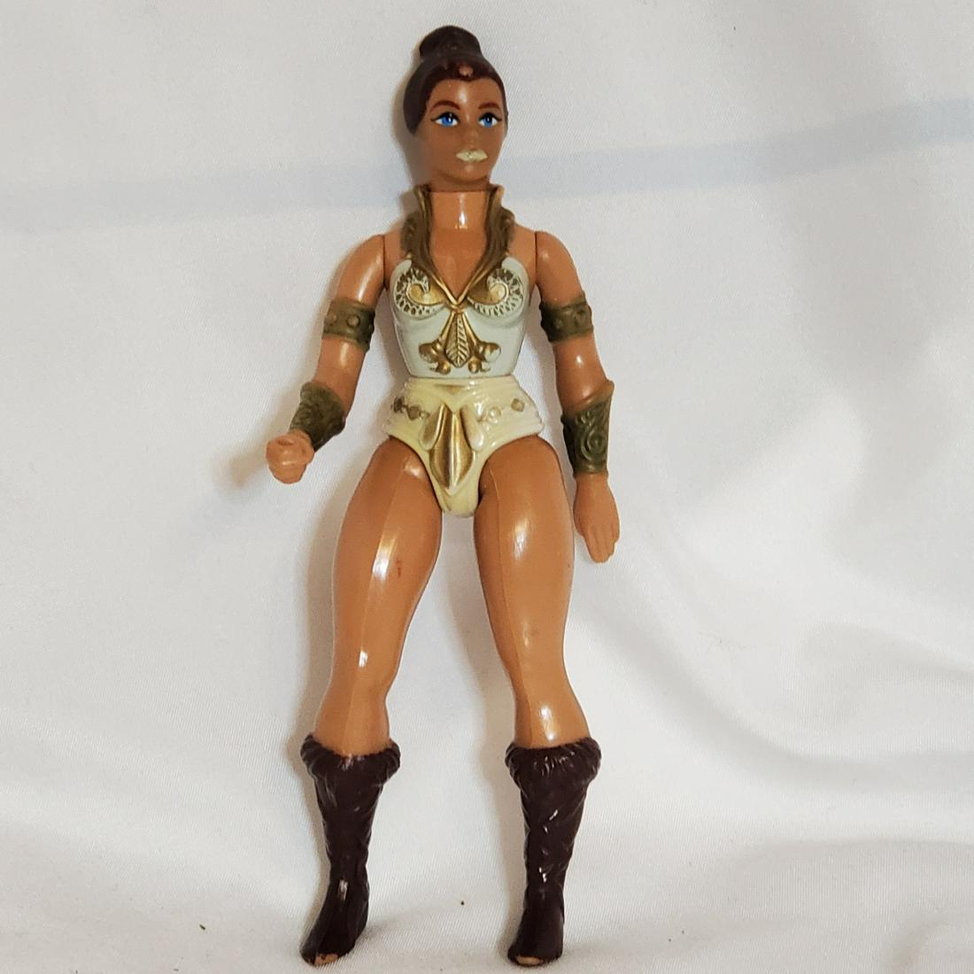 Vintage 1980's She-Ra MOTU She-Ra Teela Action Figure: Please read carefully. Description given is based on opinion unless otherwise documented. We ask that you look at pictures carefully before bidding. We are more than happy to take more pictures or ans