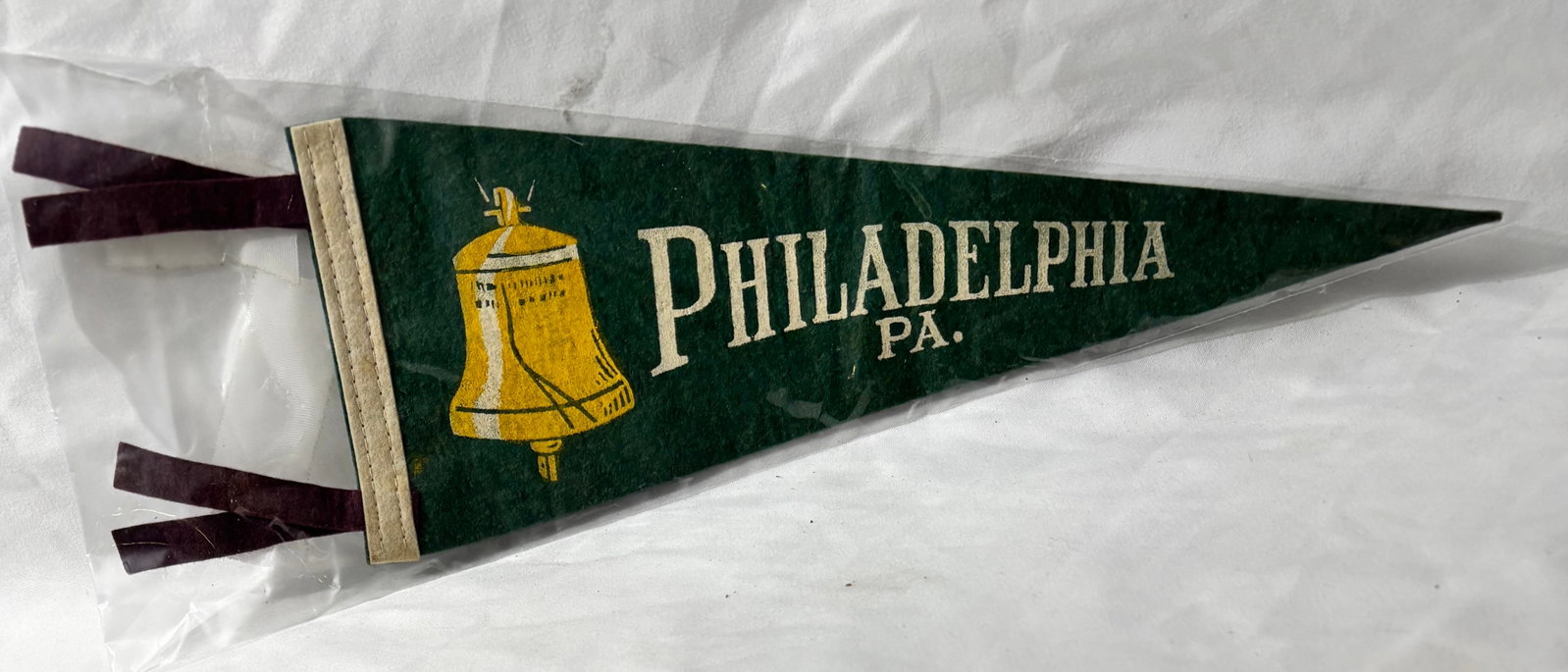 Vintage Philadelphia Pennant: 13 inch green felt pennant. Average condition for age.