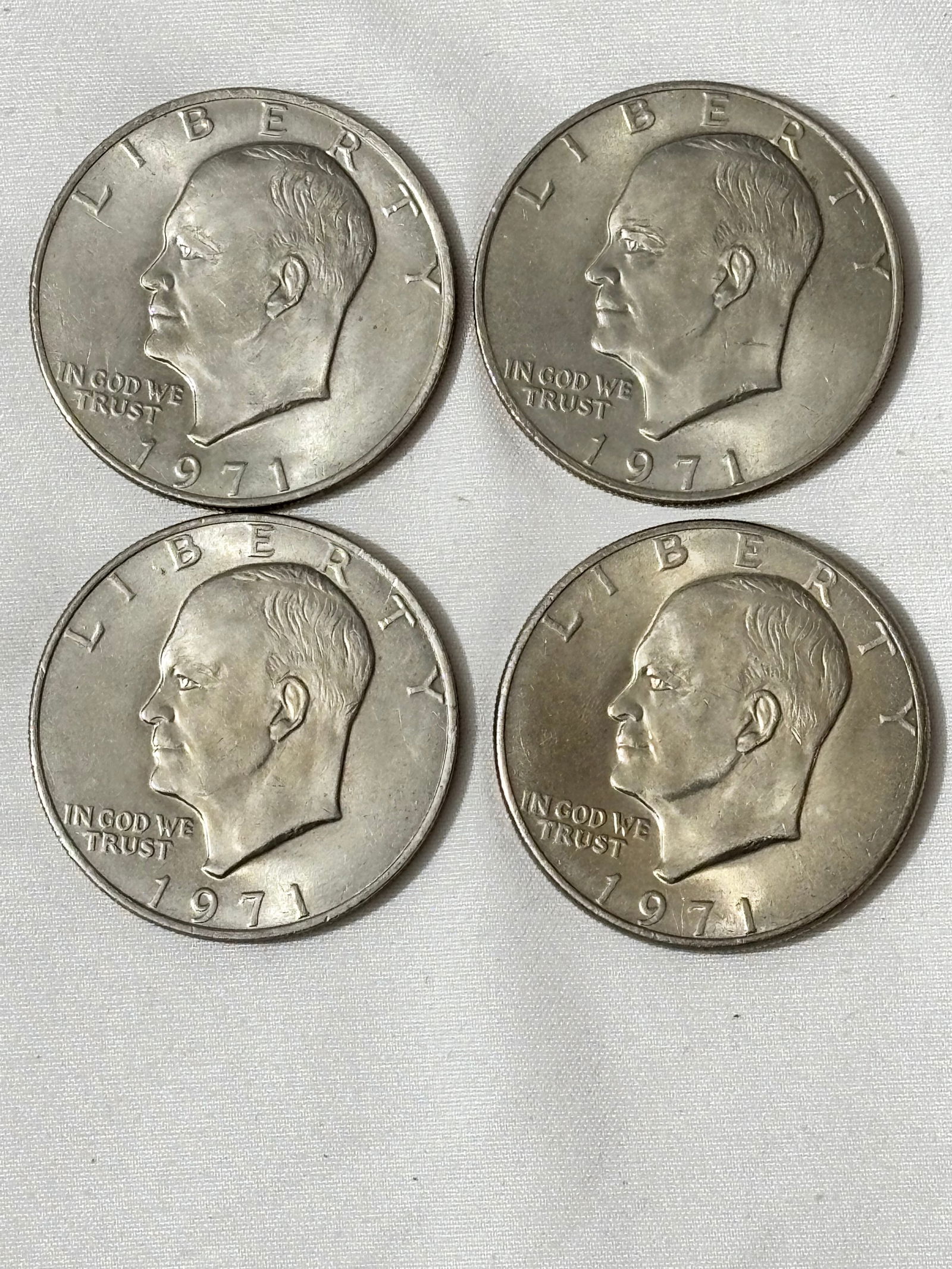 Lot of 4 Eisenhower One Dollar Coins (1 of 2)