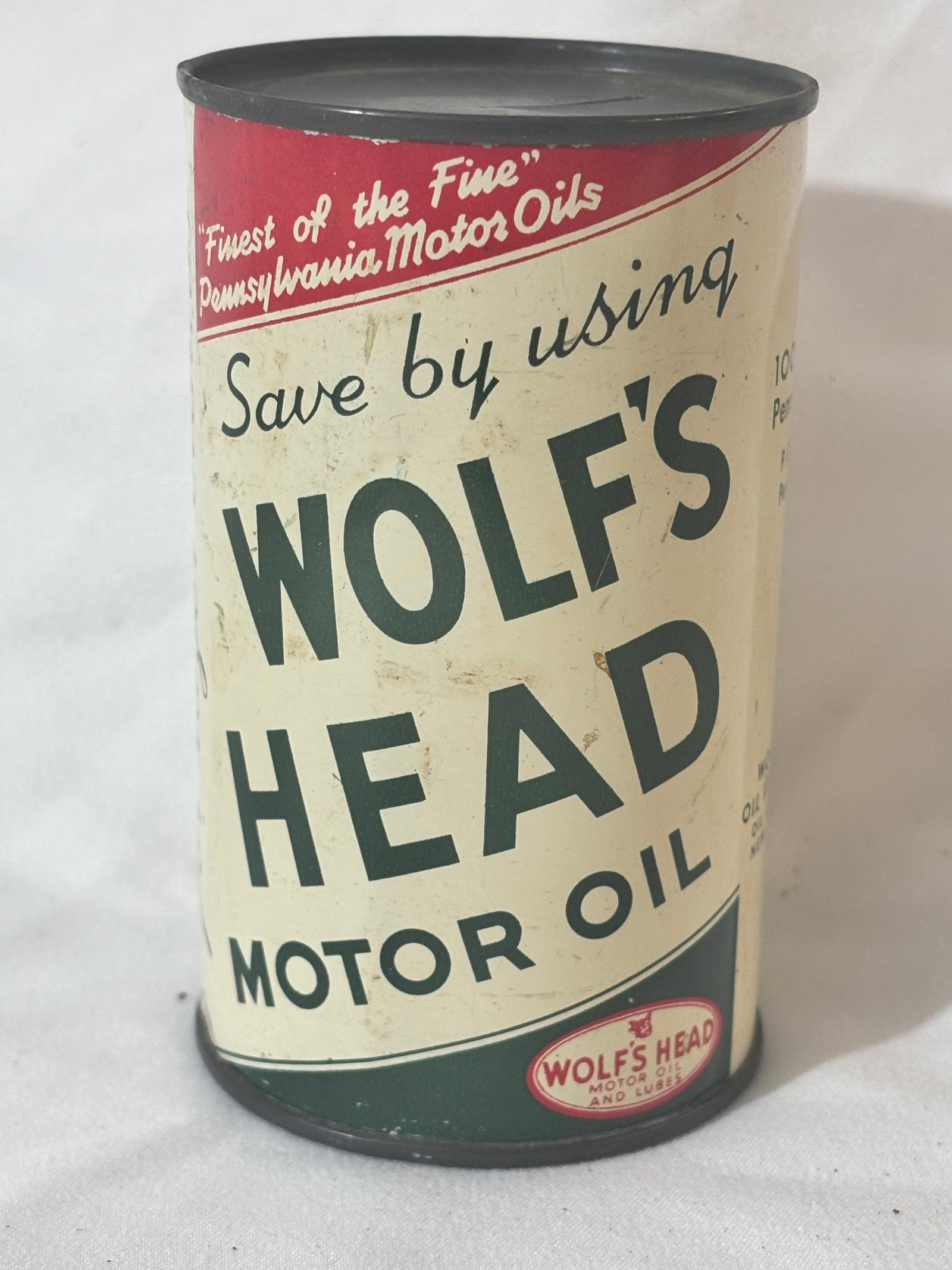Wolf's Head Motor Oil Advertising Bank: See photos