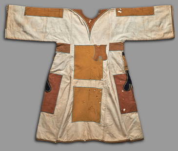 A Mahdi Tunic, Jibbeh: Sudan, Baqqara Arabs, circa 1880/90s, woven and appliqué cotton, decorated in the typical Mahdi style. Size 38 1/2 x 48 1/2 in. Provenance: Private collection, New York City.