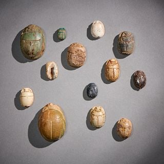 Thirteen Egyptian Scarabs: Ancient to modern dates. Largest lg. 1 1/8 in. Shipping within the continental U.S. is $40.